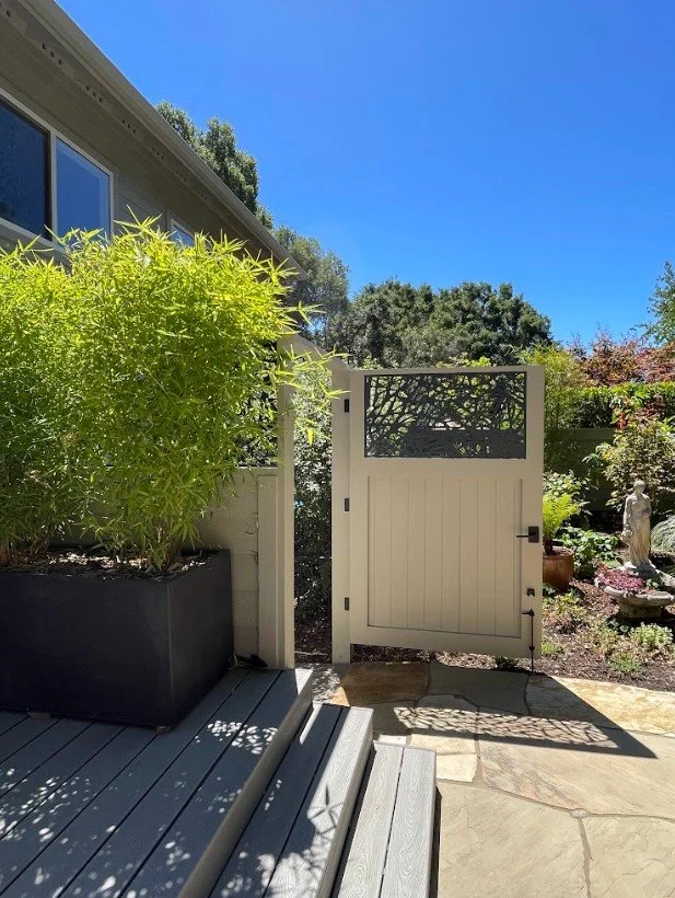 Bamboo in containers adds soft privacy to the primary bedroom deck