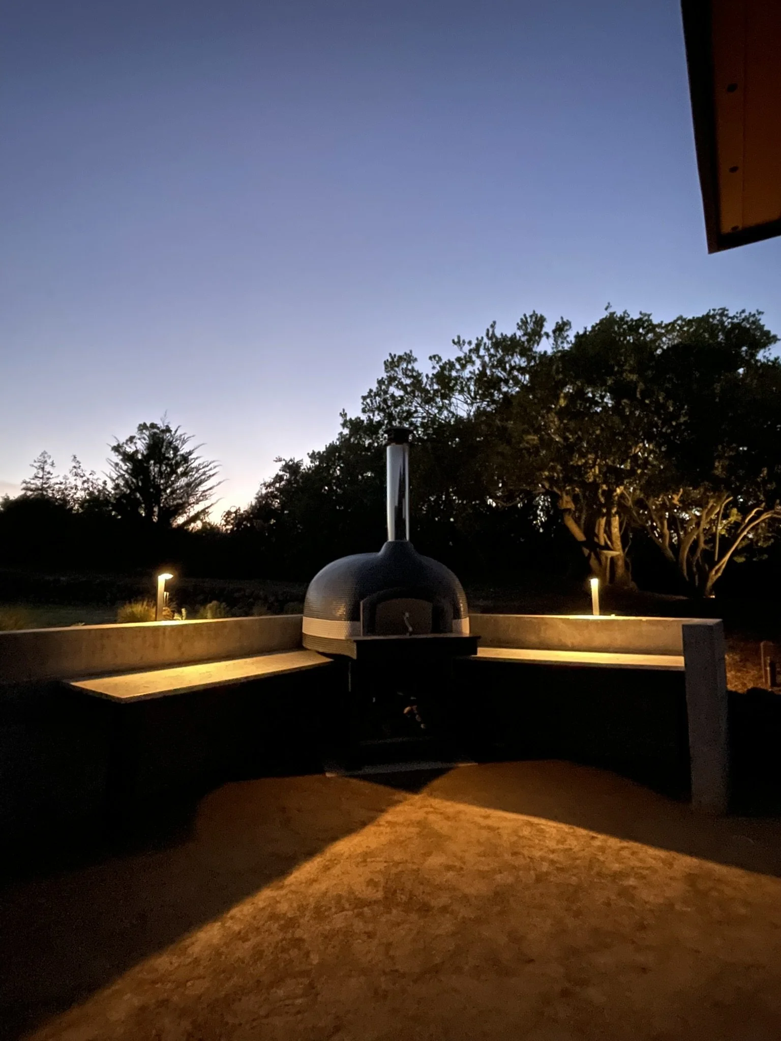Low voltage lighting at the outdoor pizza oven