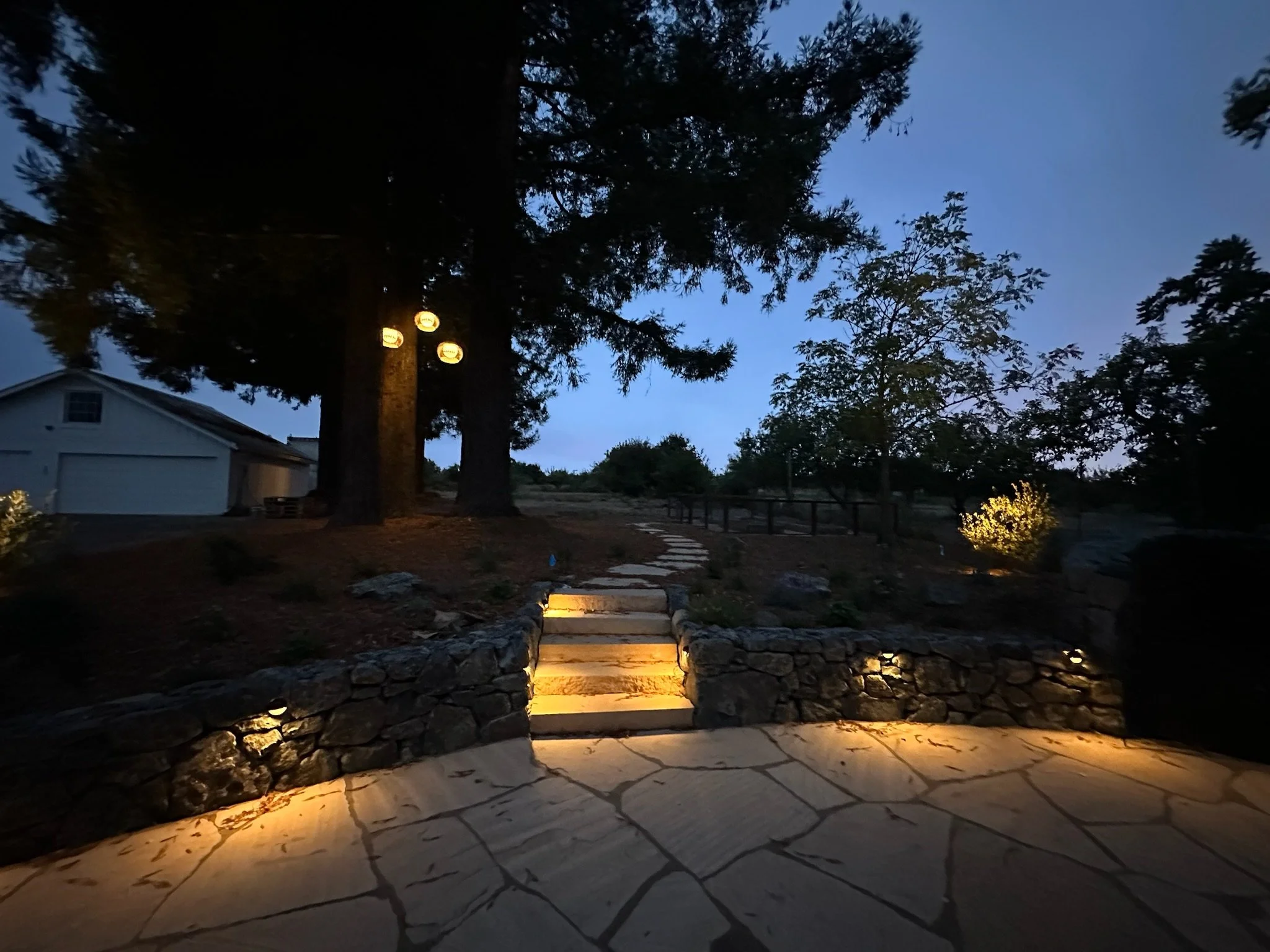 Patio seat wall at night
