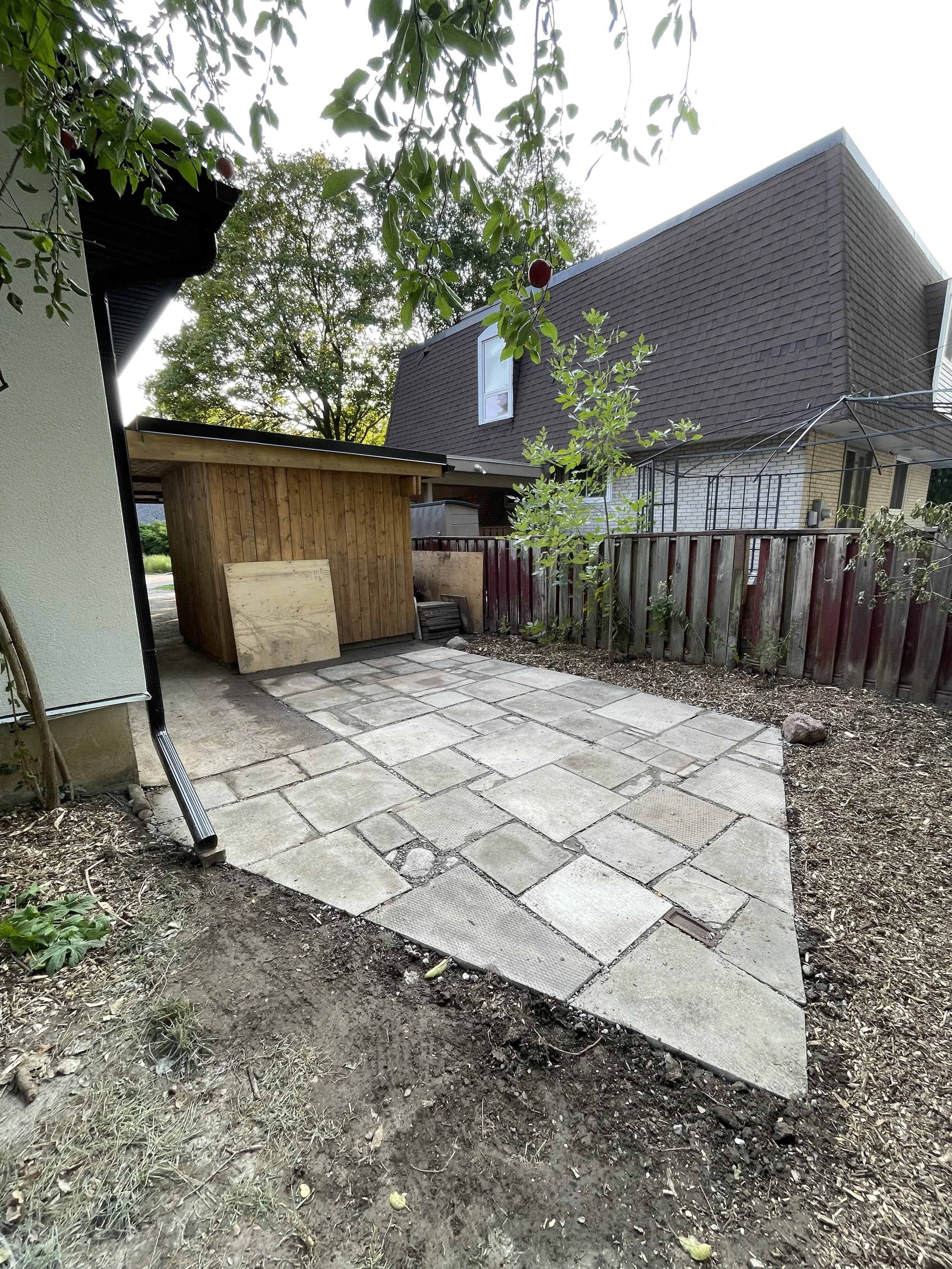 North York | Eco-friendly patio installation using up-cycled stone and concrete pavers