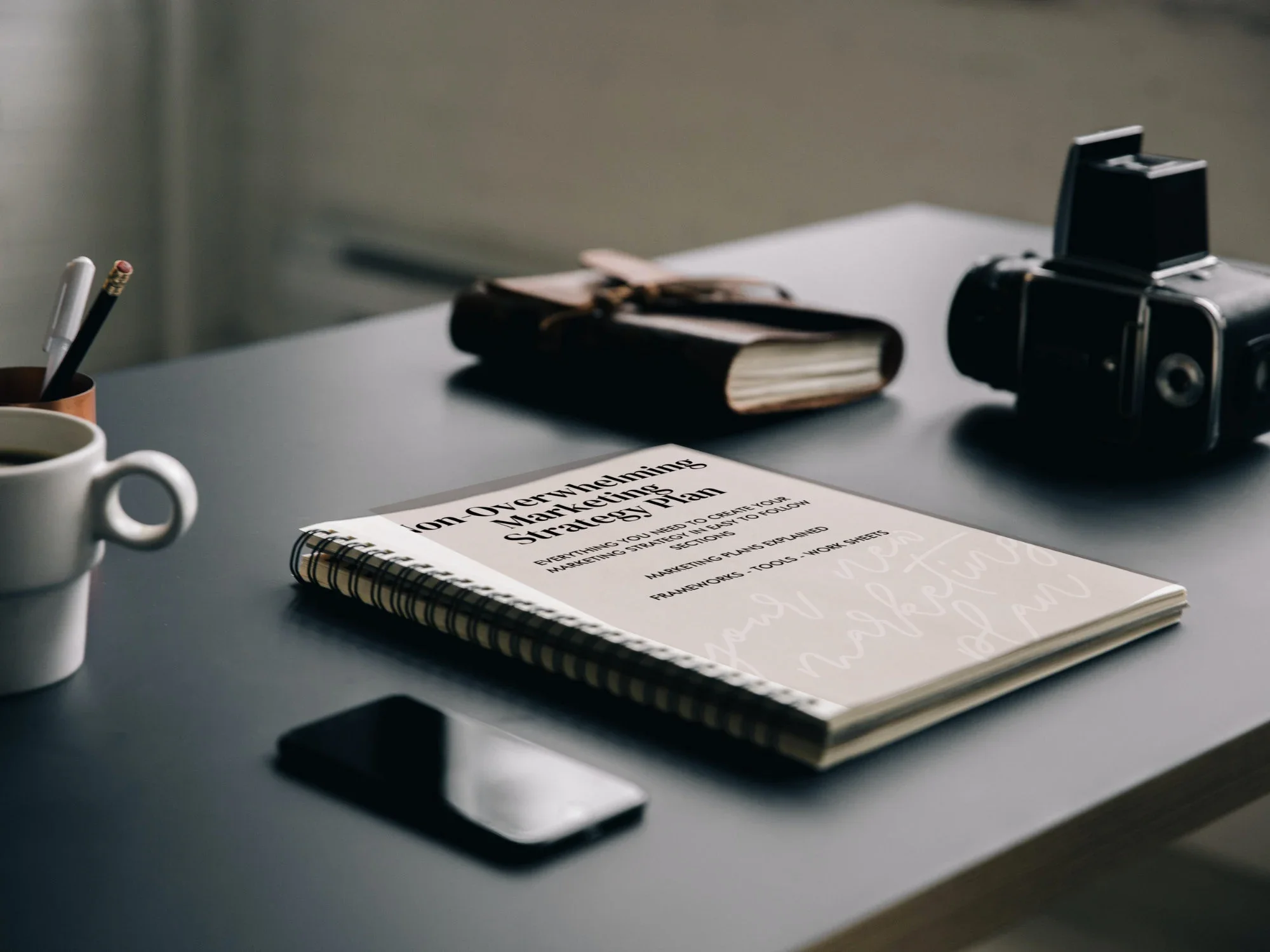 Marketing strategy planning workspace highlighting intentional decision-making for financial advisor growth.