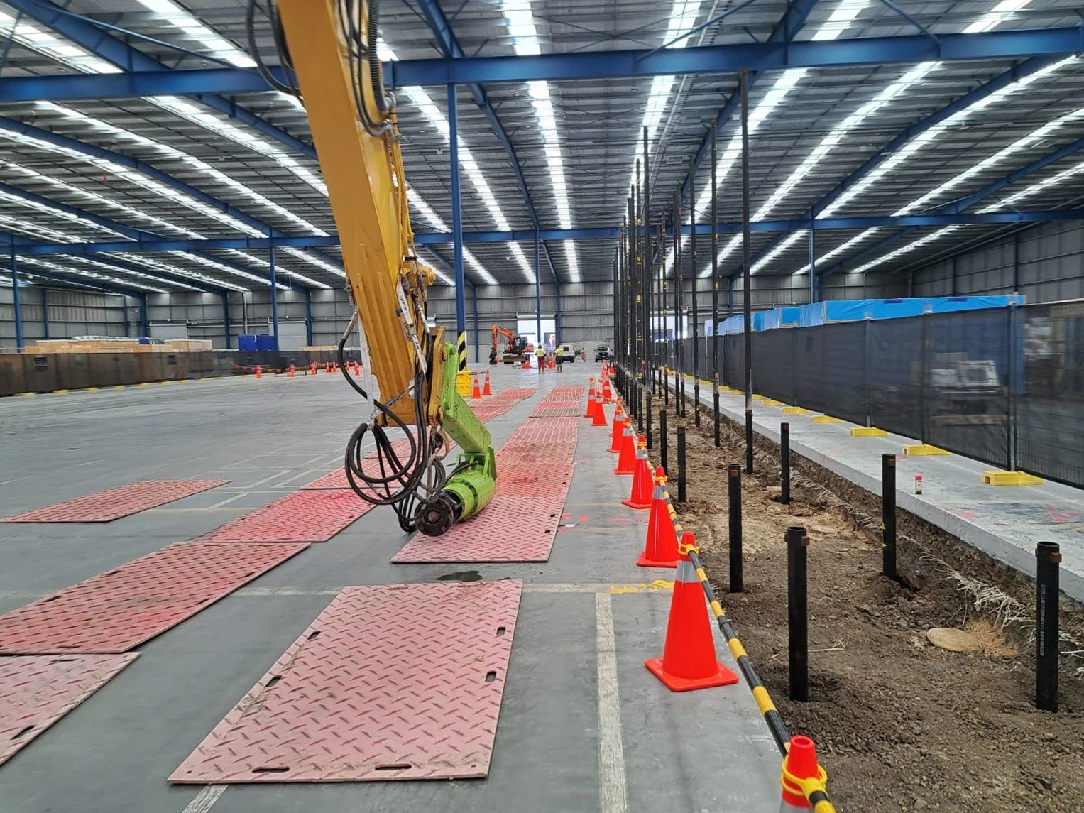Screw piling site inside a structure