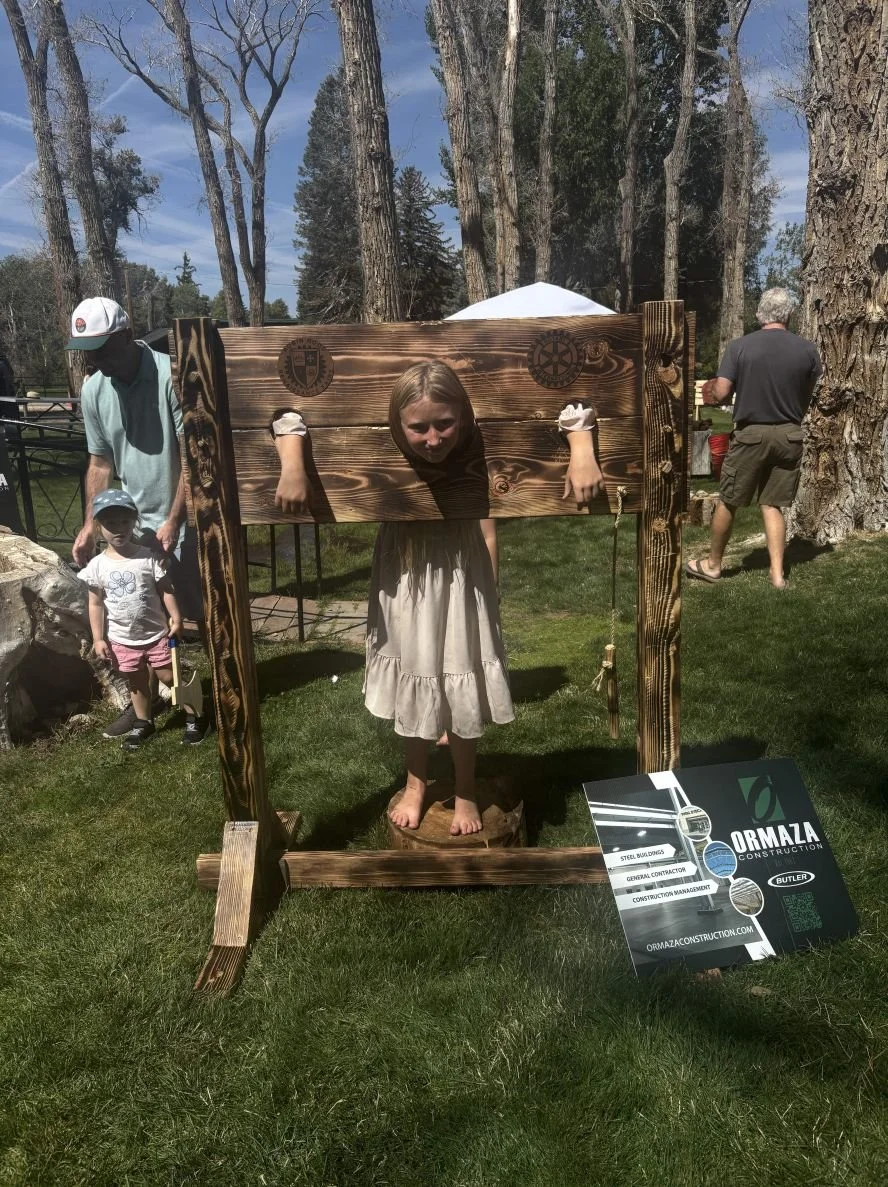 Girl in pillory at Robin Hood Renaissance Faire (12).jpg
