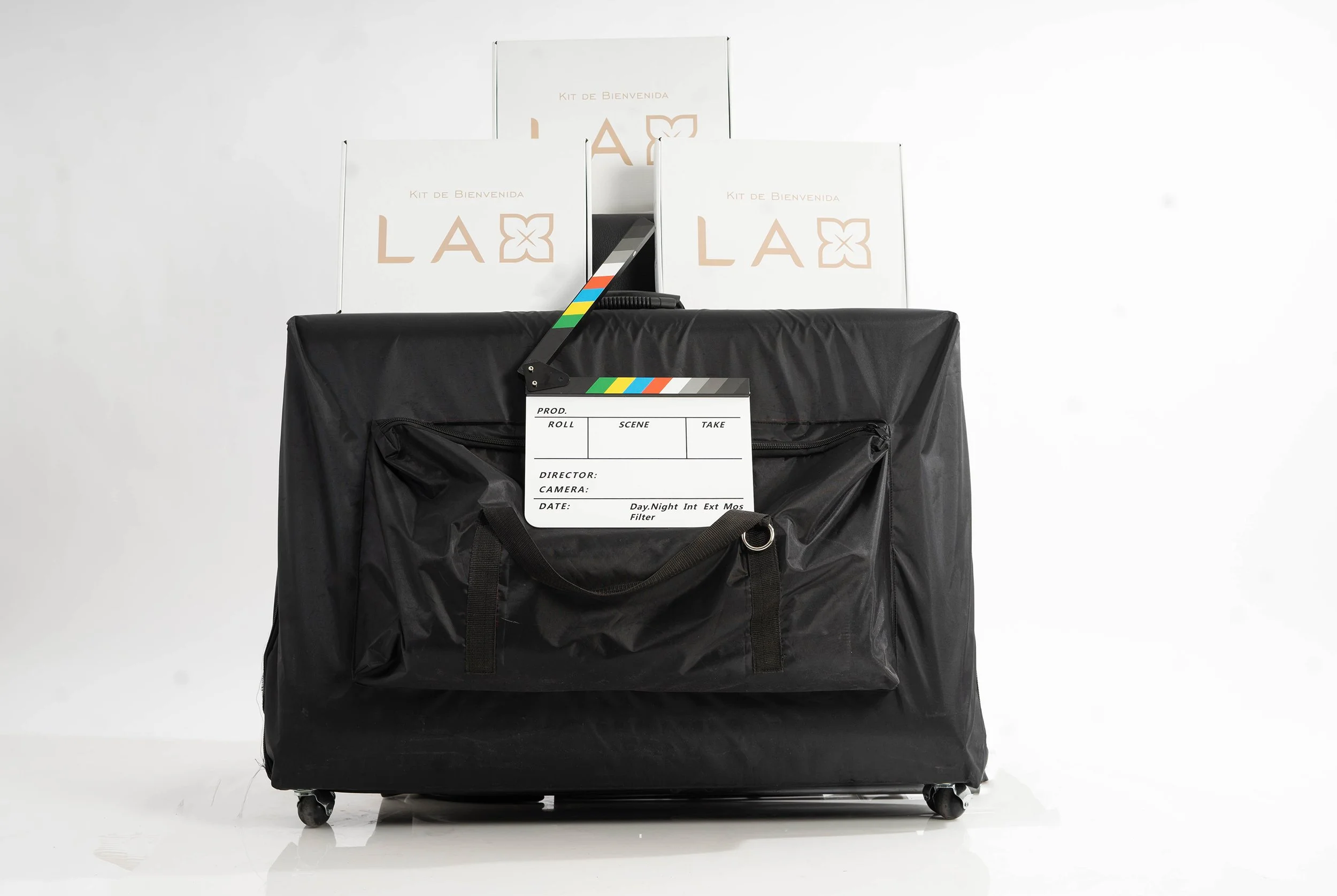 Kit de bienvenida LAX con camilla portátil y claqueta, glamoroso preludio en spas en CDMX.