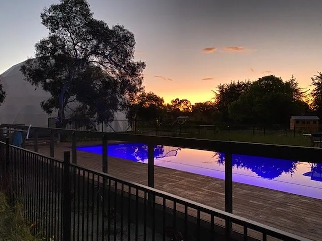Heated mineral hydrotherapy spa at sunset at Little Farm of Calm, Benalla