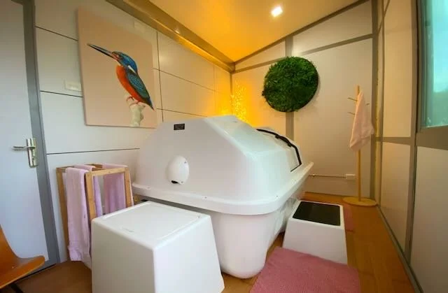 Float therapy tank at Little Farm of Calm wellness retreat, Benalla Victoria — magnesium salt hydrotherapy for deep relaxation and muscle recovery
