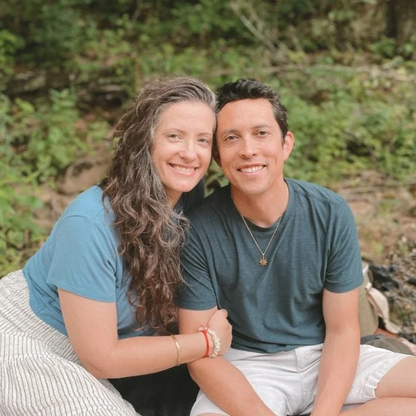 A woman holds her heart with eyes closed, contemplating how to have better relationships.