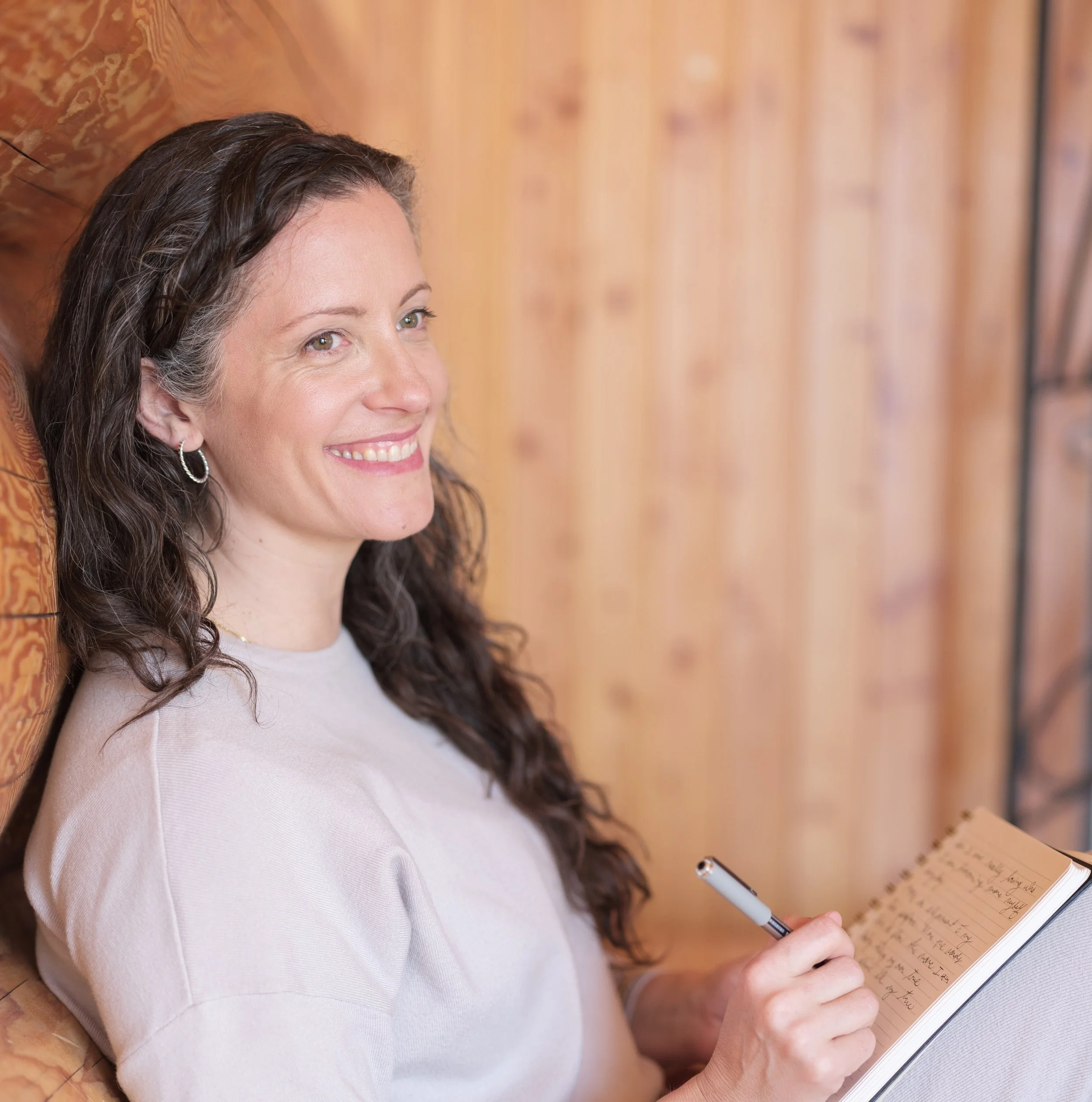 Two people look at each other and smile, an example of a dream relationship