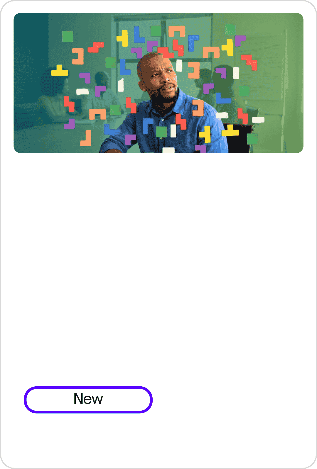 A man in a blue shirt looking to the side, with colorful puzzle pieces falling around him, in a classroom setting with a whiteboard and students in the background. No text or buttons are visible.