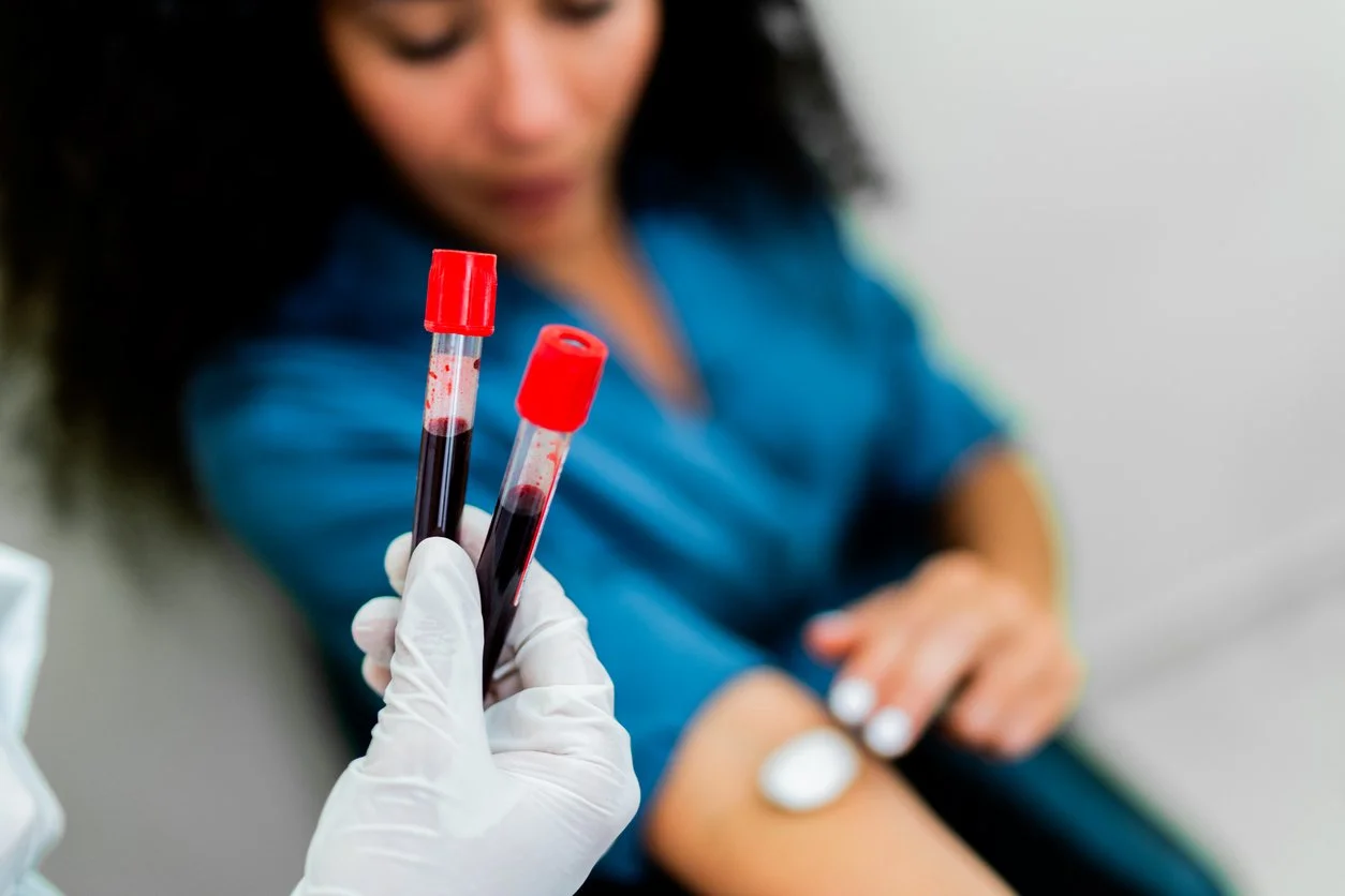 Woman receiving a blood draw
