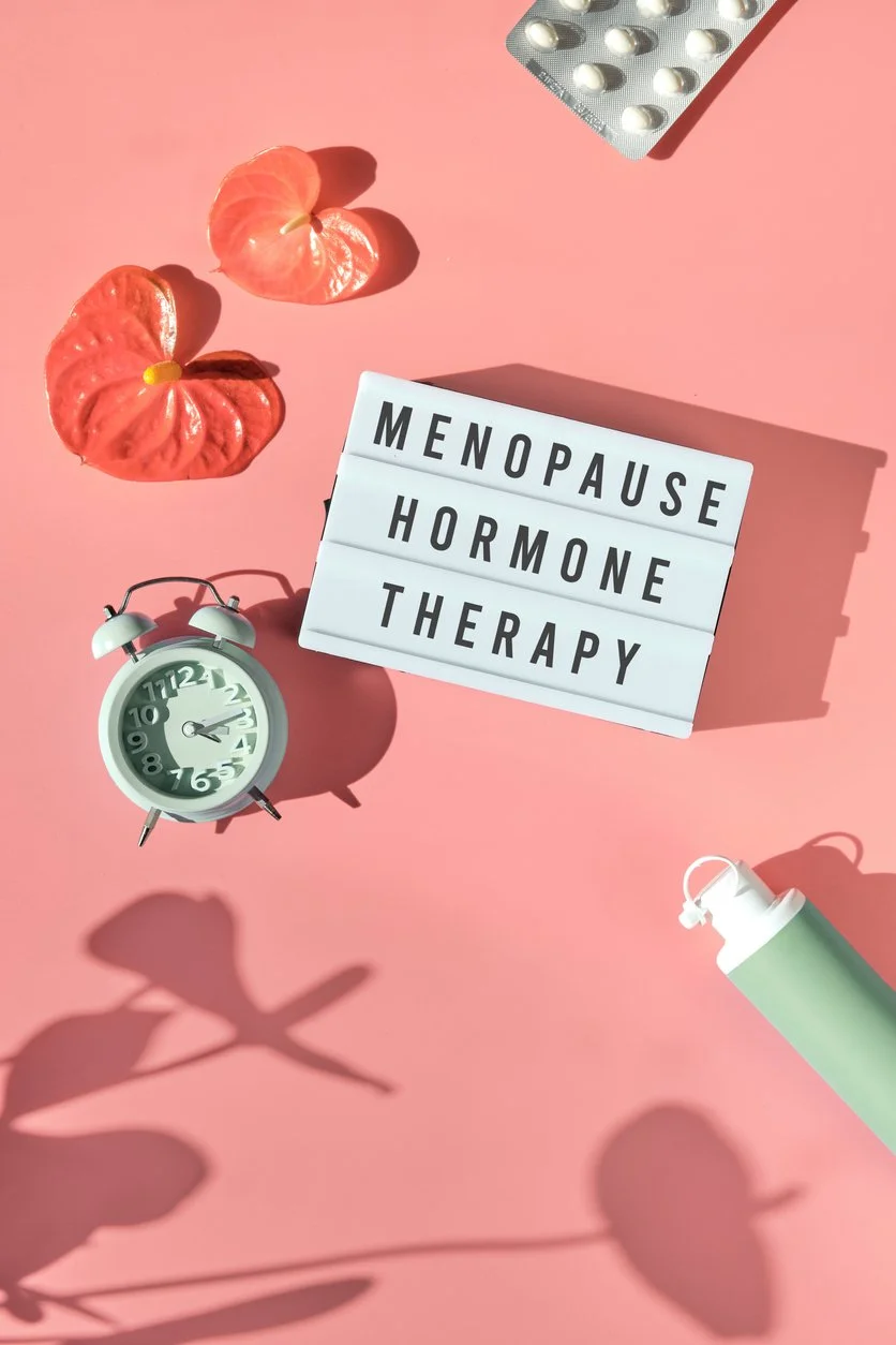 Menopause hormone therapy text on pink background