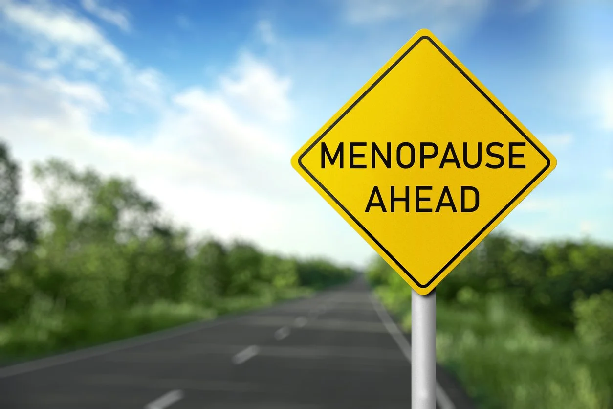 A sign that reads "menopause ahead"