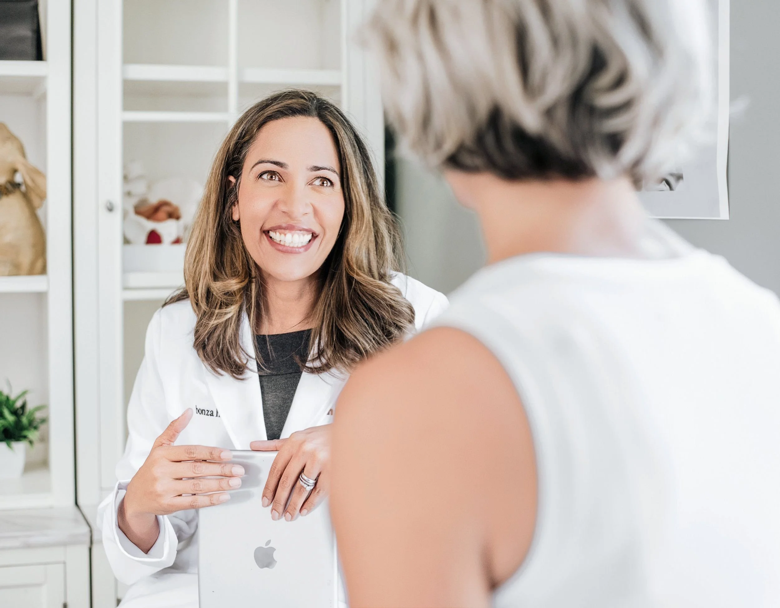 Dr. Sarah Bonza meeting with a patient at Bonza Health