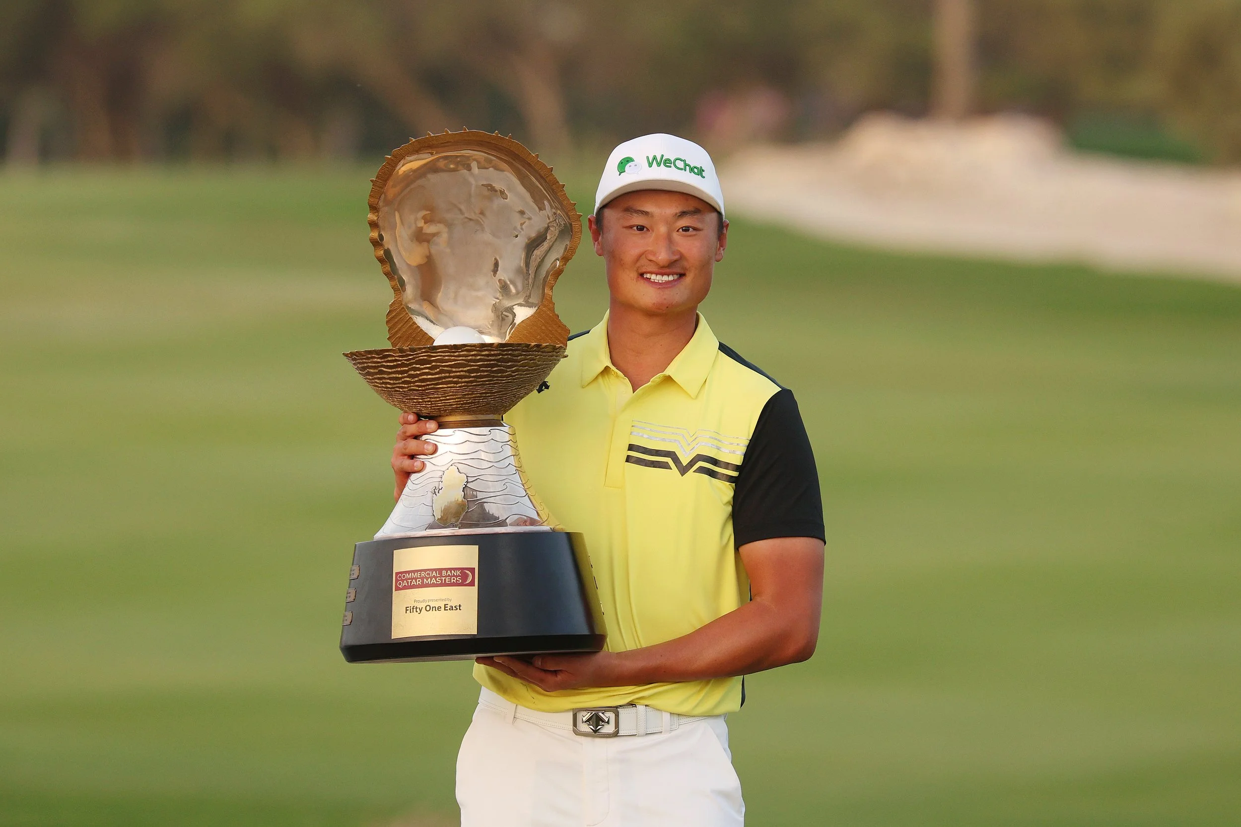 Li Haotong Triumphs at the Commercial Bank Qatar Masters with Clutch