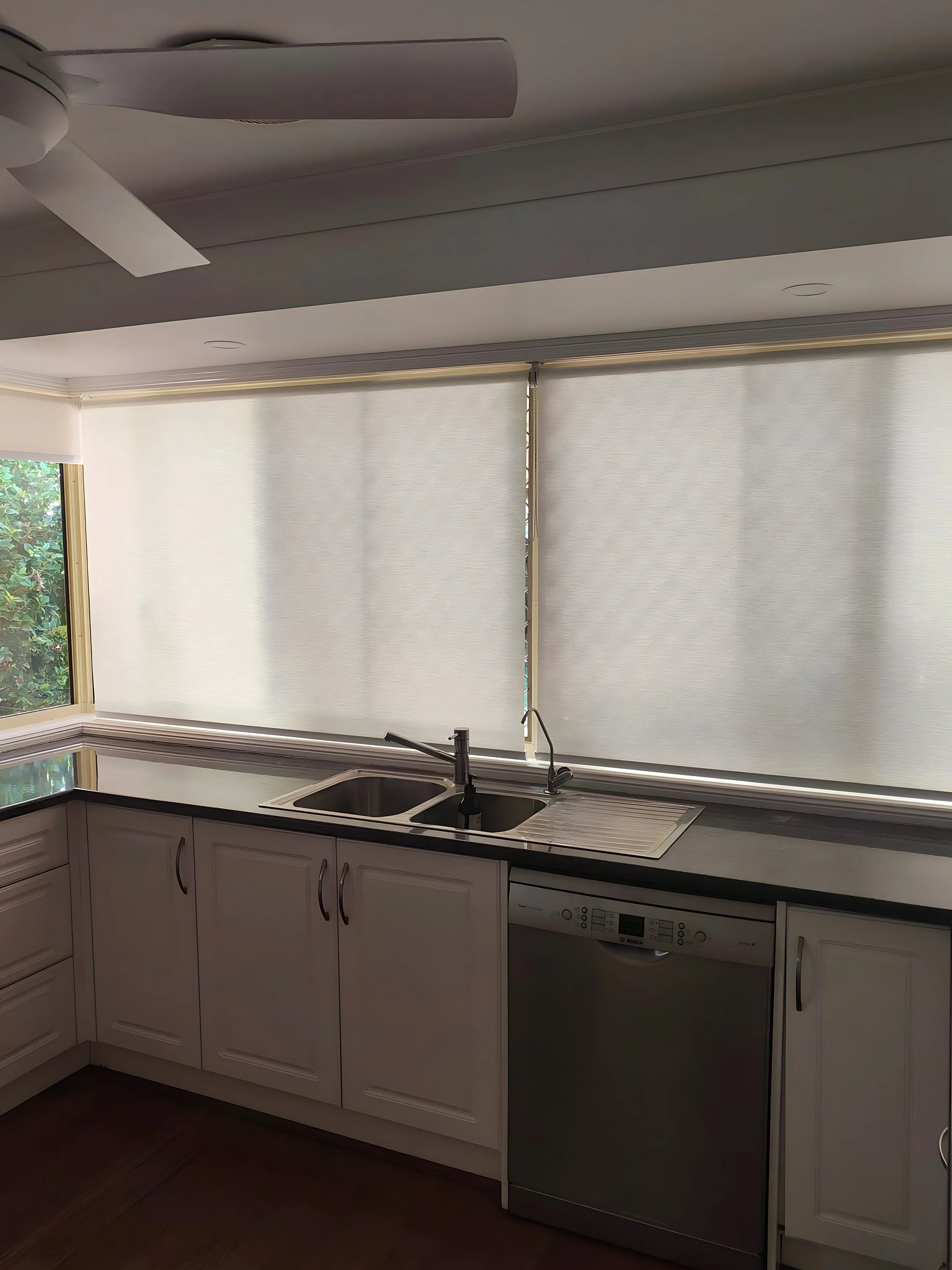 Roller Blinds are a versatile and stylish window covering solution that offers both privacy and light control.