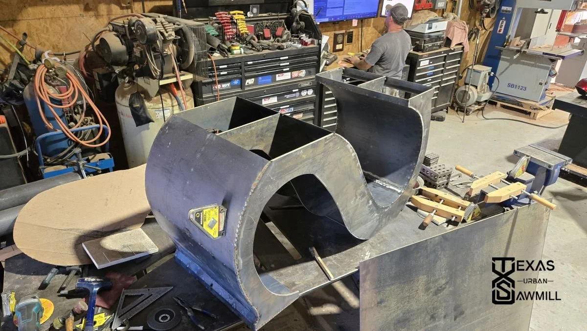 The base design was inspired by our client’s last name, making it truly personal. Fabricated entirely in-house, from bending the steel to precise TIG and MIG welding, the base took about three months to complete. Its 13 steel components are seamlessl