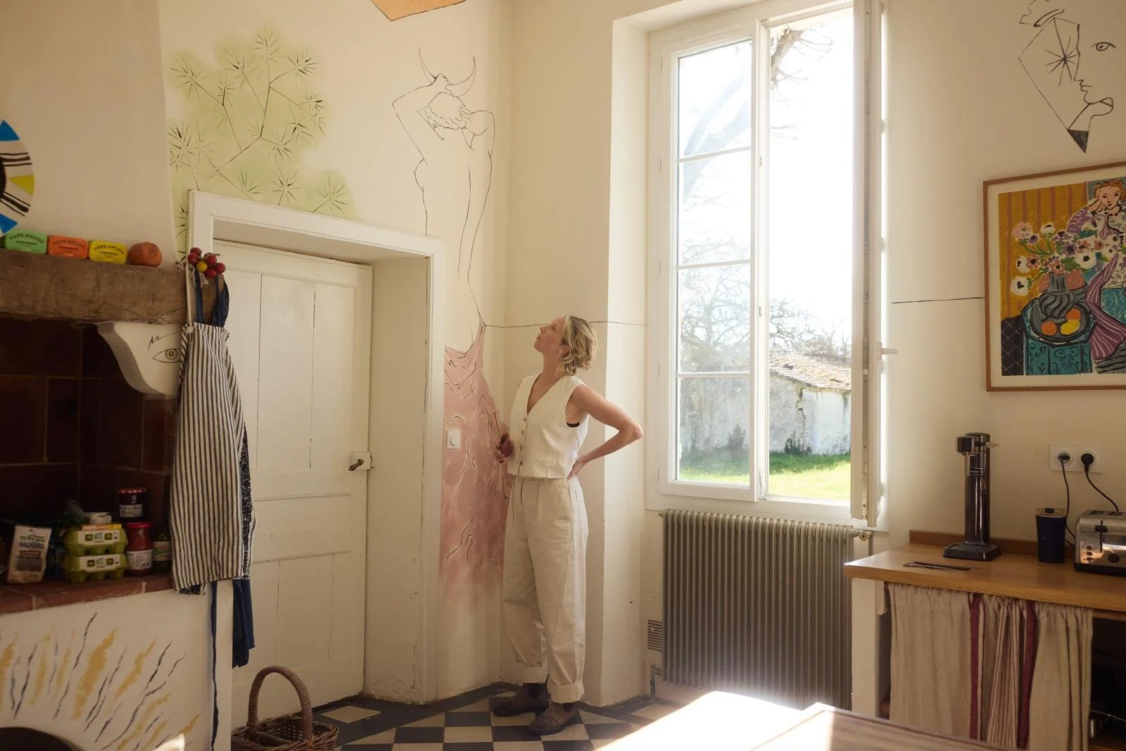 Watch Nancy paint our Mural!