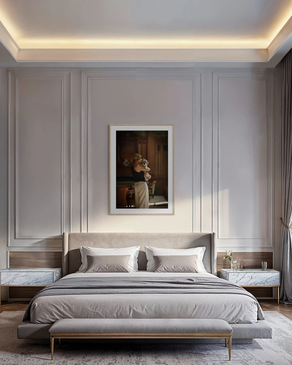 Framed portrait of a woman kissing her dog during a photography session at Raffles London at The OWO, displayed above a bed in a contemporary hotel suite