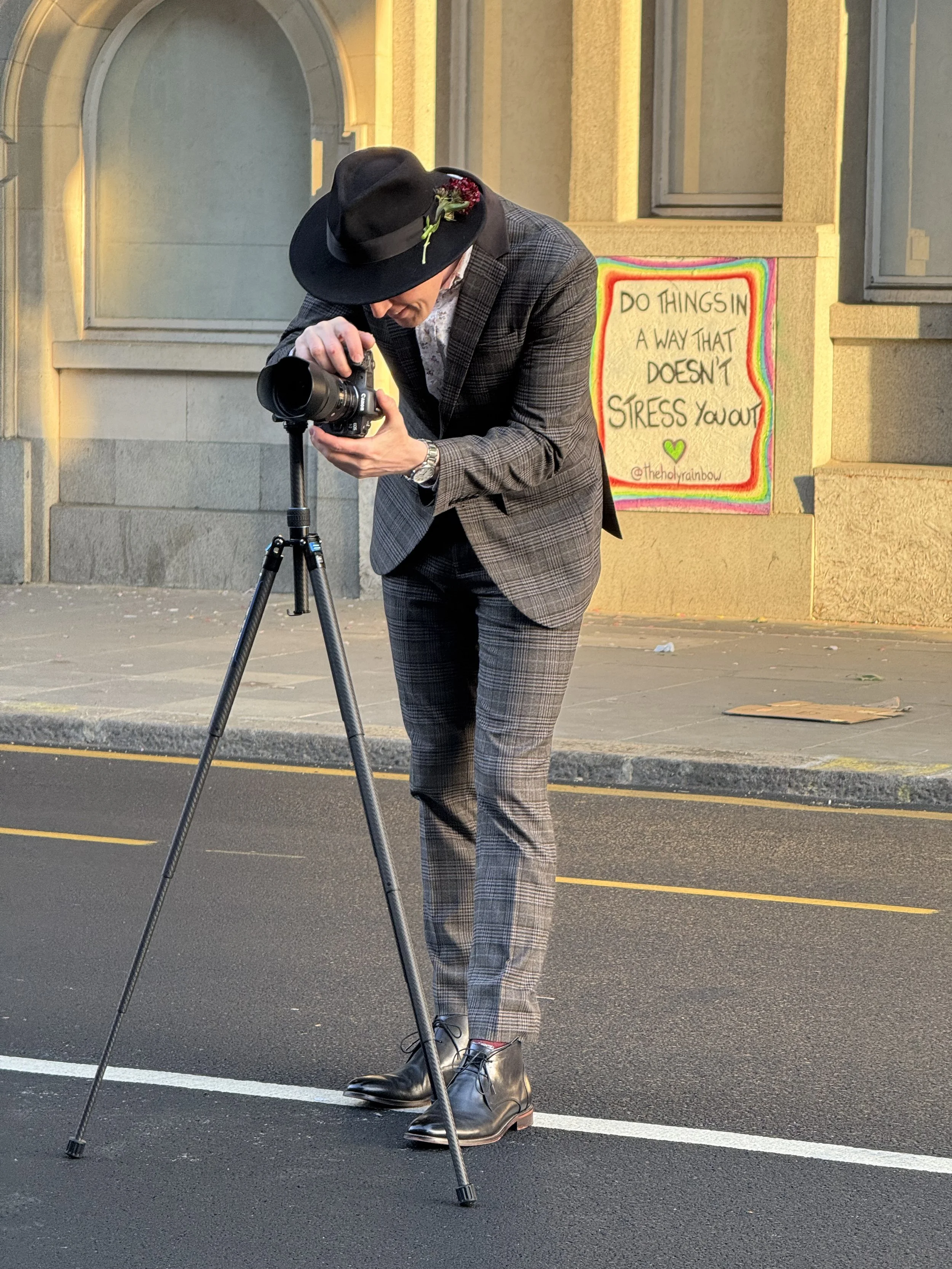 Andrew Raven preparing his camera for a dog portrait on location in London.