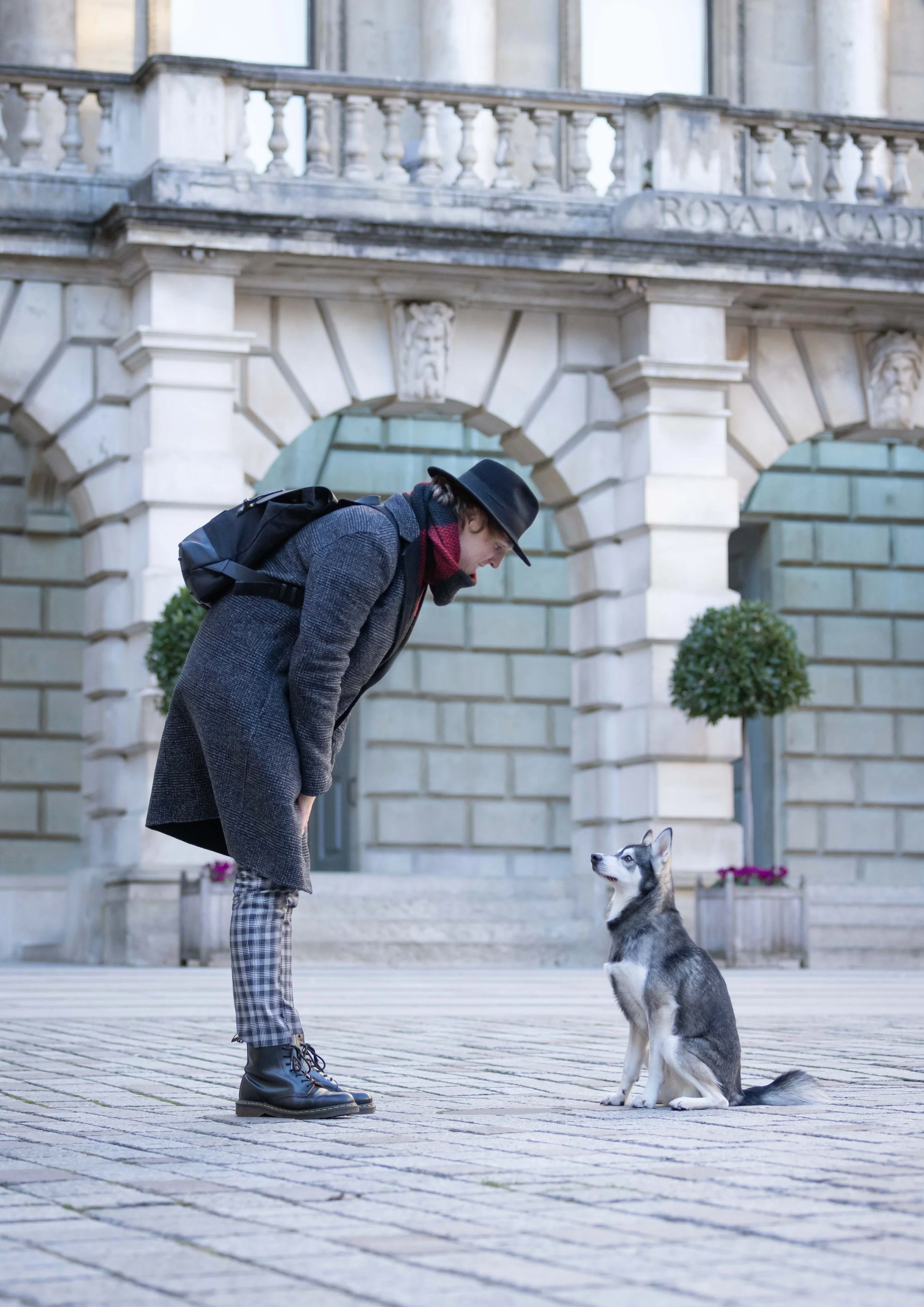 Andrew Raven with his dog Jack Jack outside the Royal Academy in London.