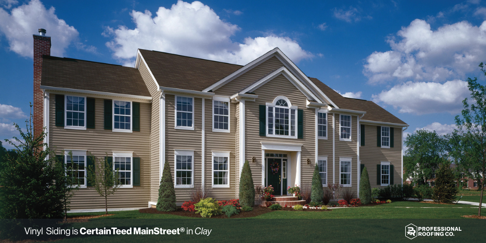 Traditional tan vinyl lap siding on colonial-style home exterior