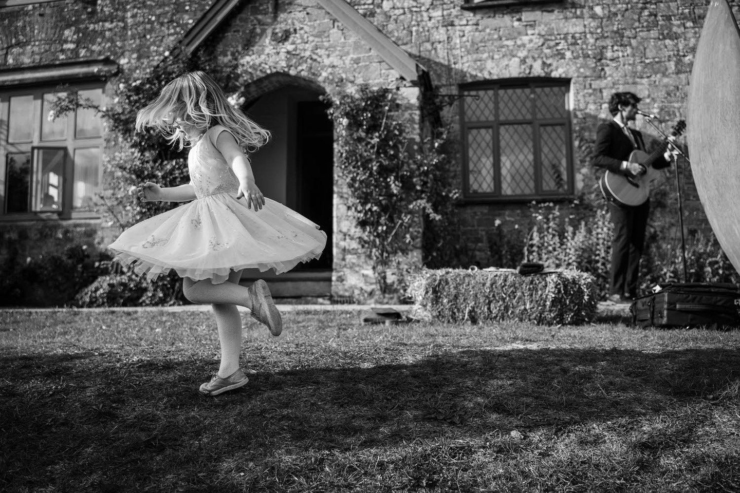 I'm spinning around, move out of my way...!⁠
⁠
#documentaryweddingphotography #funweddingphotography #blackandwhiteweddingphotography #flowergirl #weddings2024 #weddingphotographecornwall