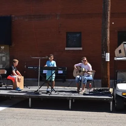 Live performance at the Dogtown Street Musician's festival including Ms. Brown on acoustic guitar, Damien on vocals & keys, and Will on the cajòn