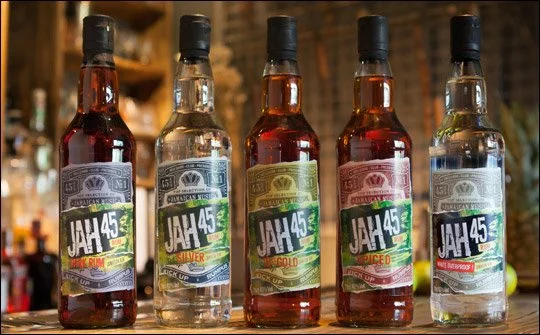 Five bottles of JAH 45 flavored alcohol arranged in a row, each with different colored labels.
