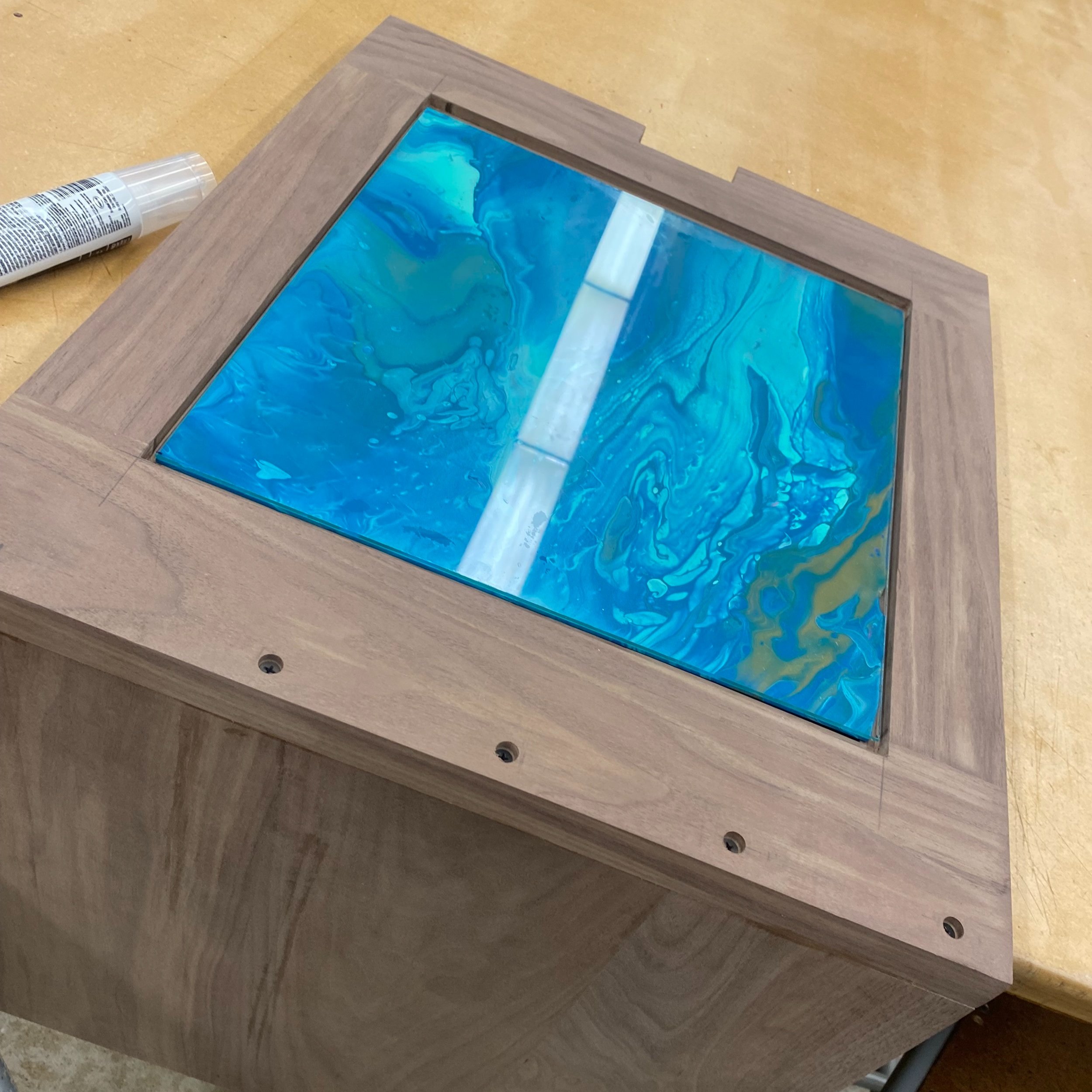 Applying the Acrylic paint poured glass