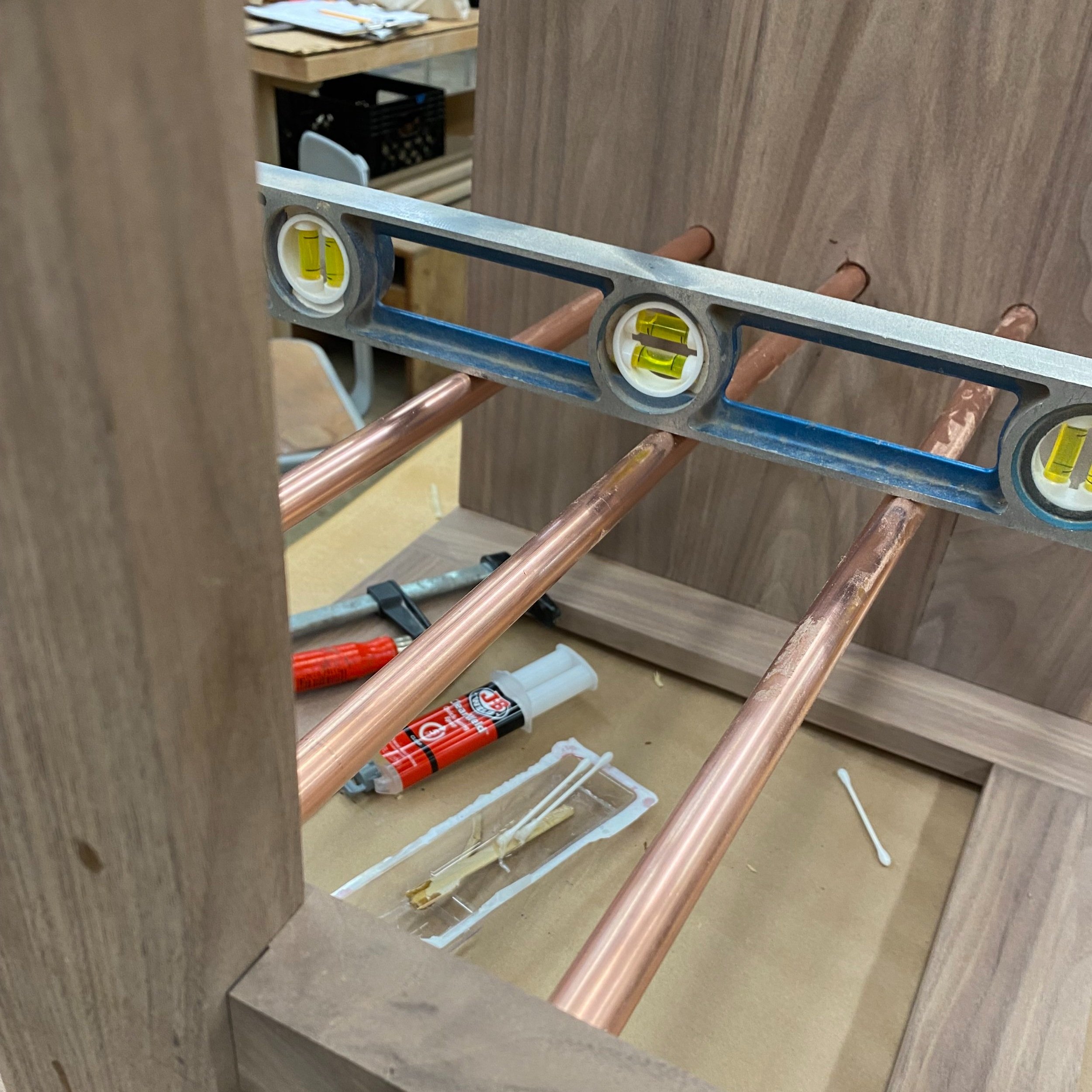 Checking level of shelving