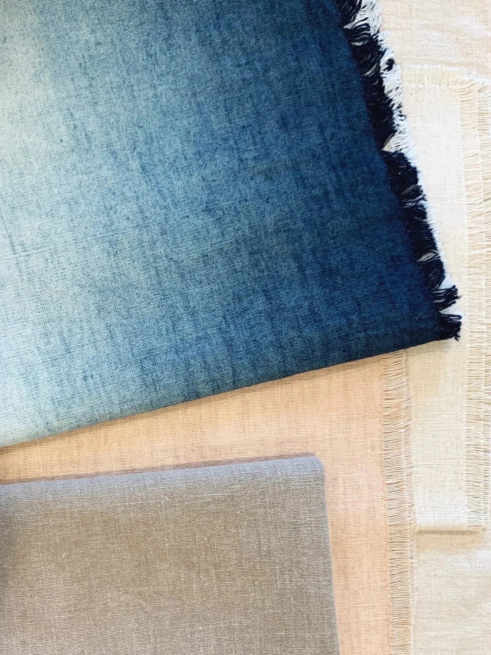 E-E Home Amagansett — Capsule collection of kitchen linens · Plant-dyed and mud-washed by the hands that dye yarns for Oshima Tsumugi, known as the Queen of Kimono · 2022