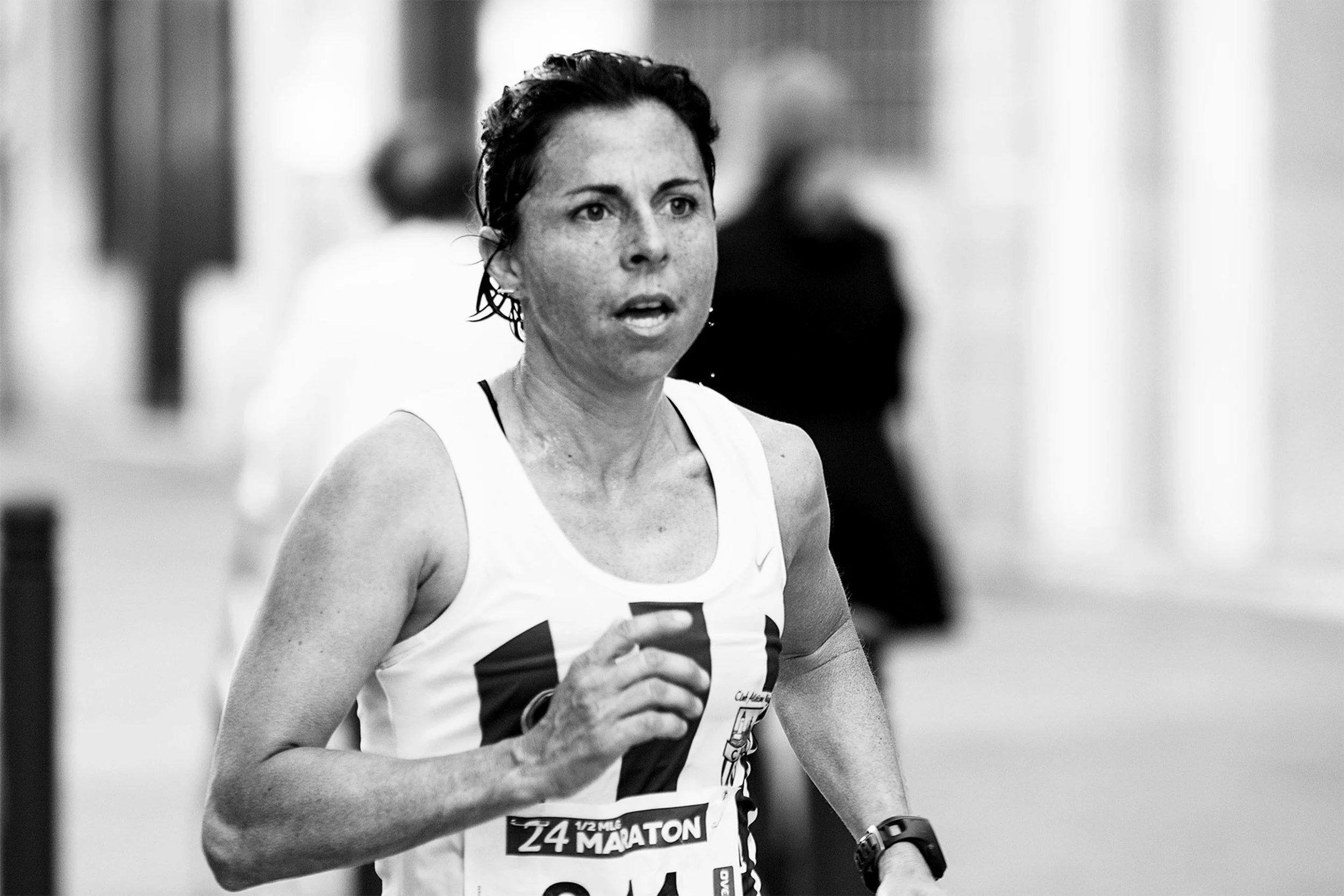 A woman running in a marathon