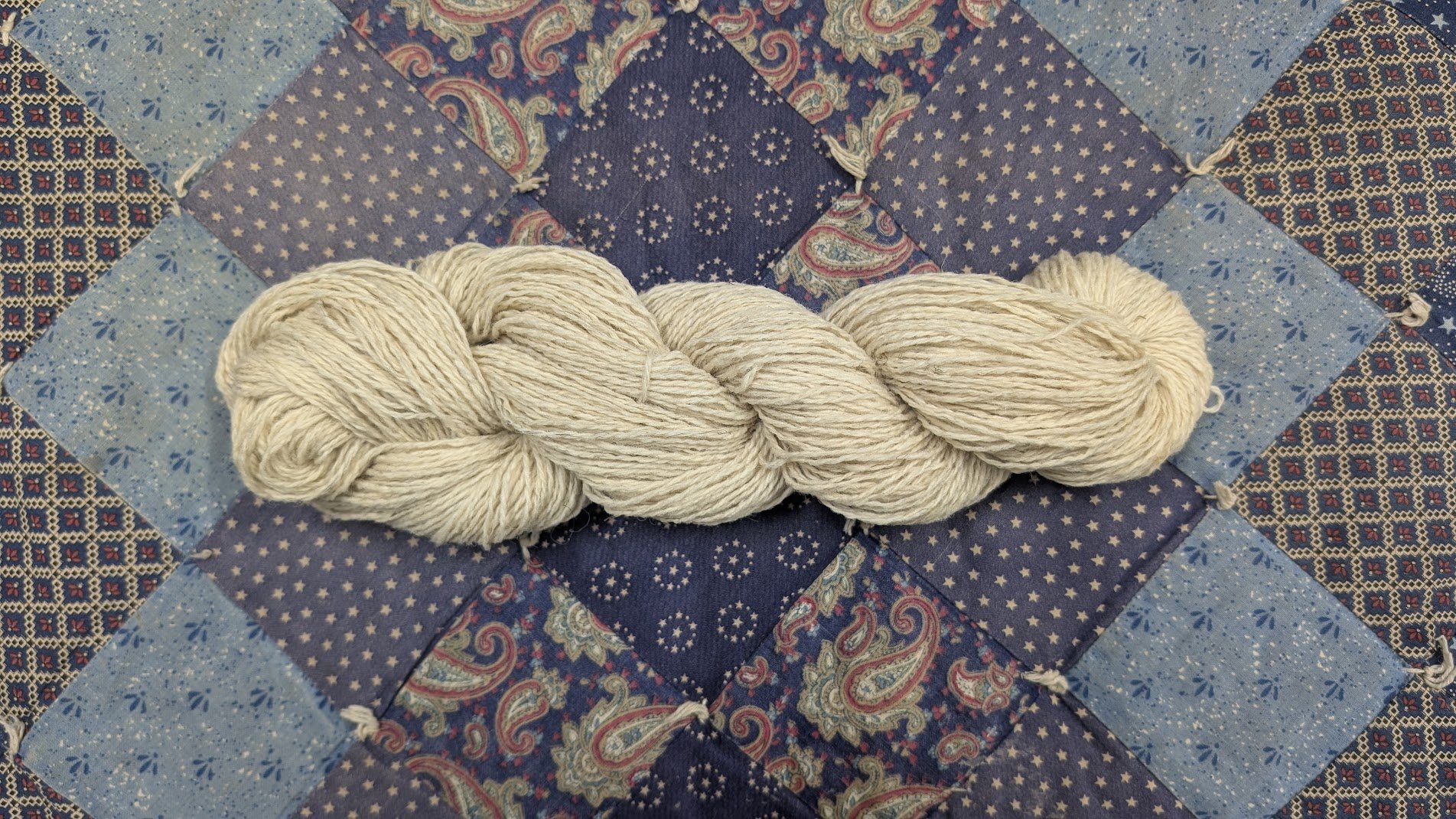 White Icelandic millspun sport:sock weigiht 2ply .jpg