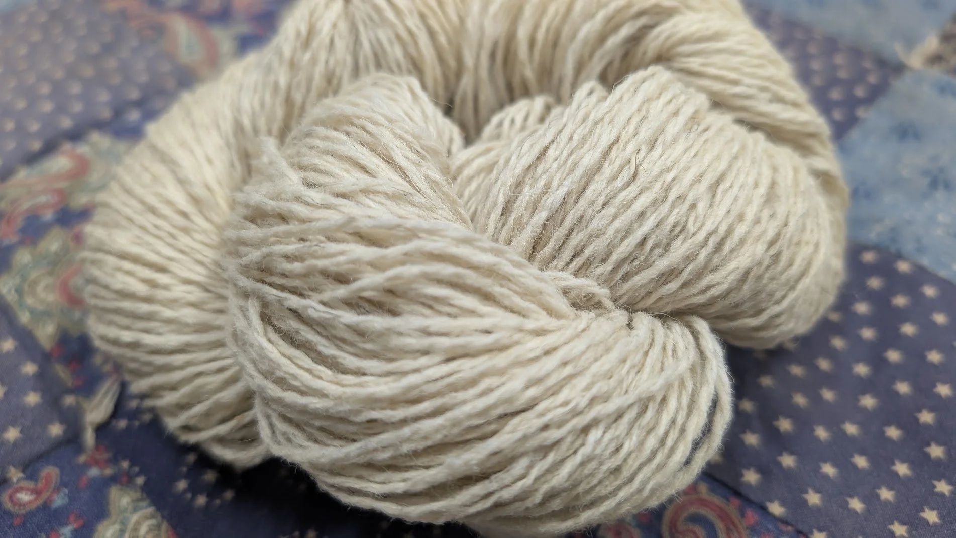 White Icelandic millspun sport:sock weigiht 2ply 2 .jpg