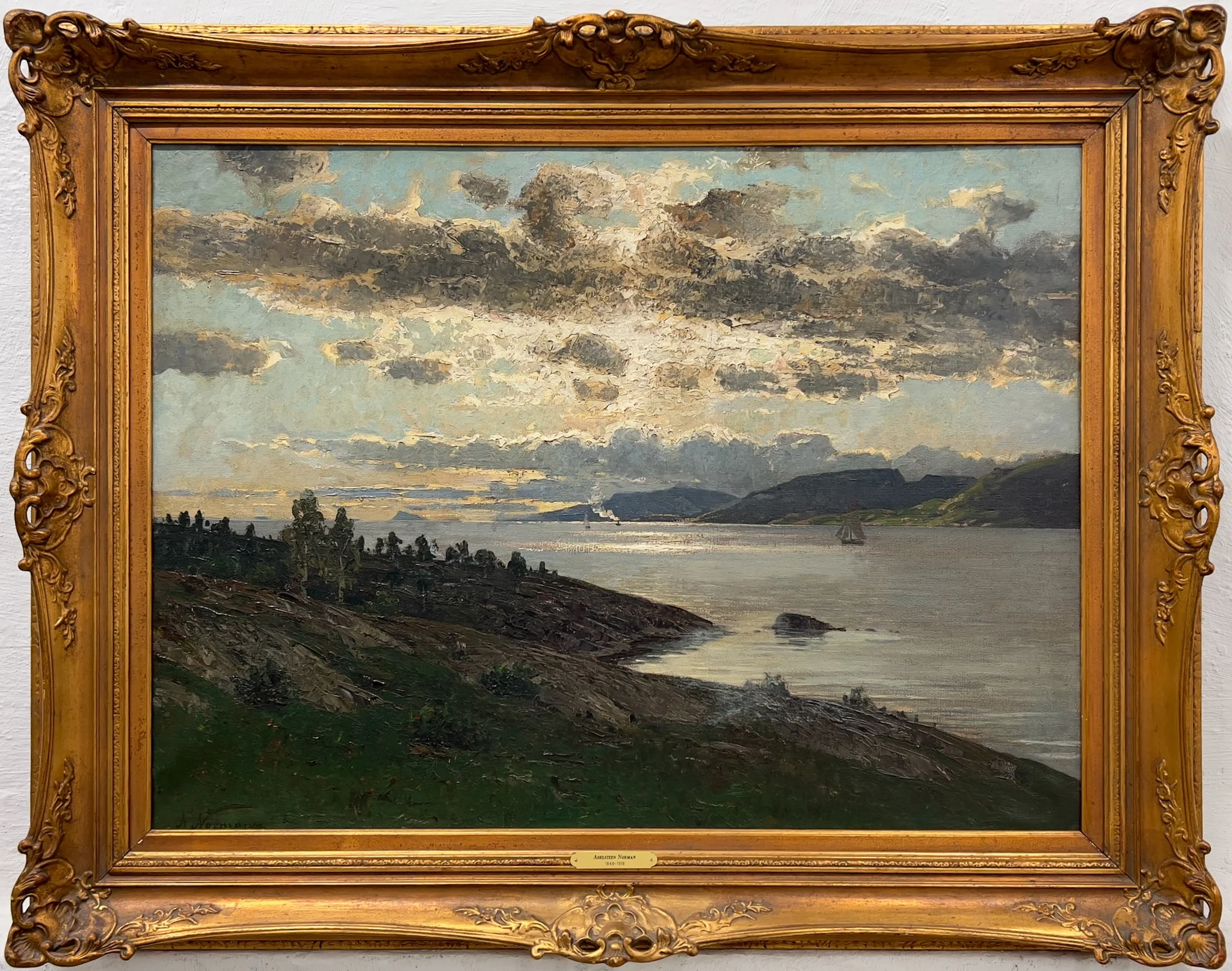 Kystlandskap av Adelsteen Normann (1848-1918), H 94 x B 120 cm, ikke datert, olje på lerret, startpris kr. 50.000