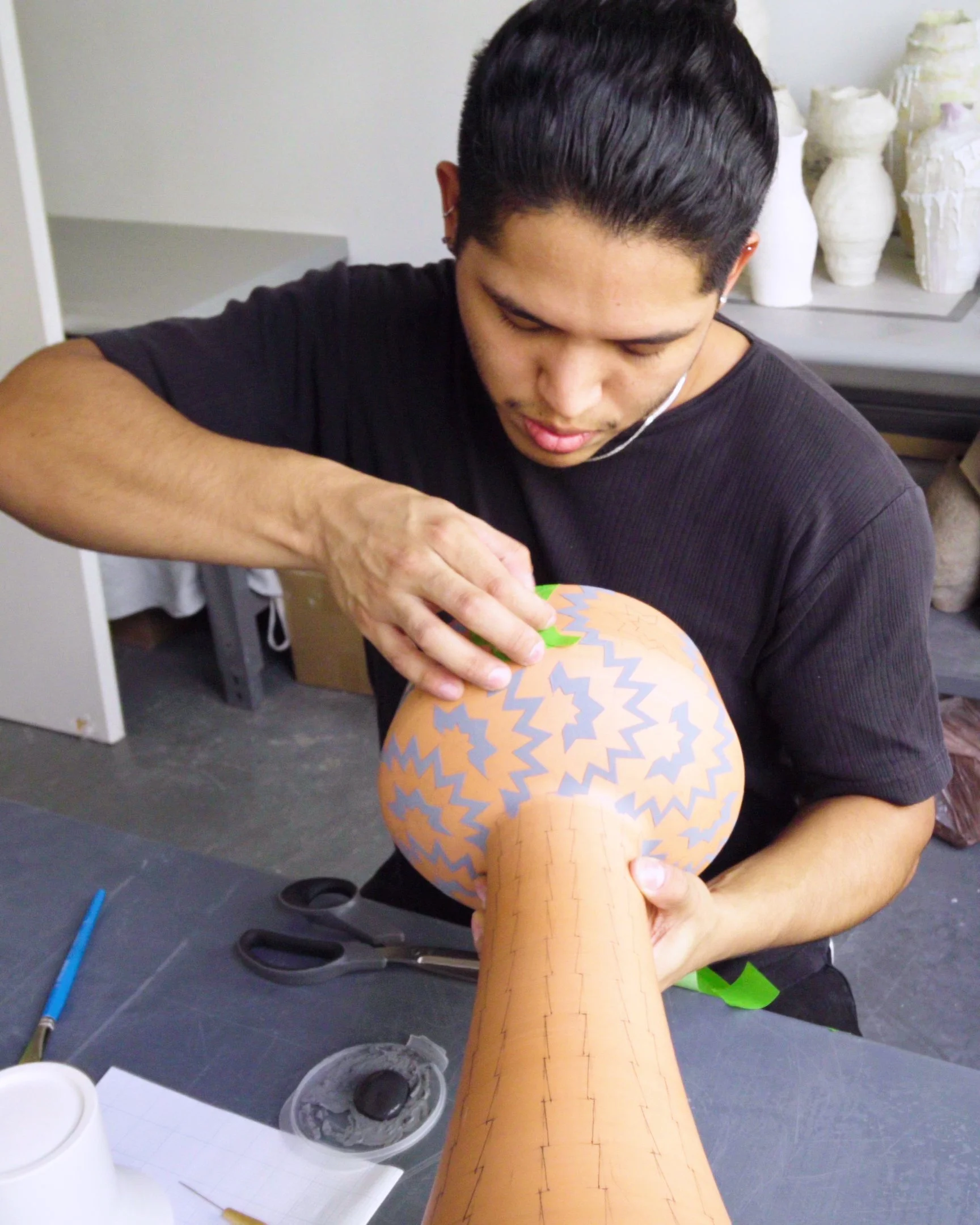 Francisco creates patterns that are multiplied and interlocked across the vessel surface.