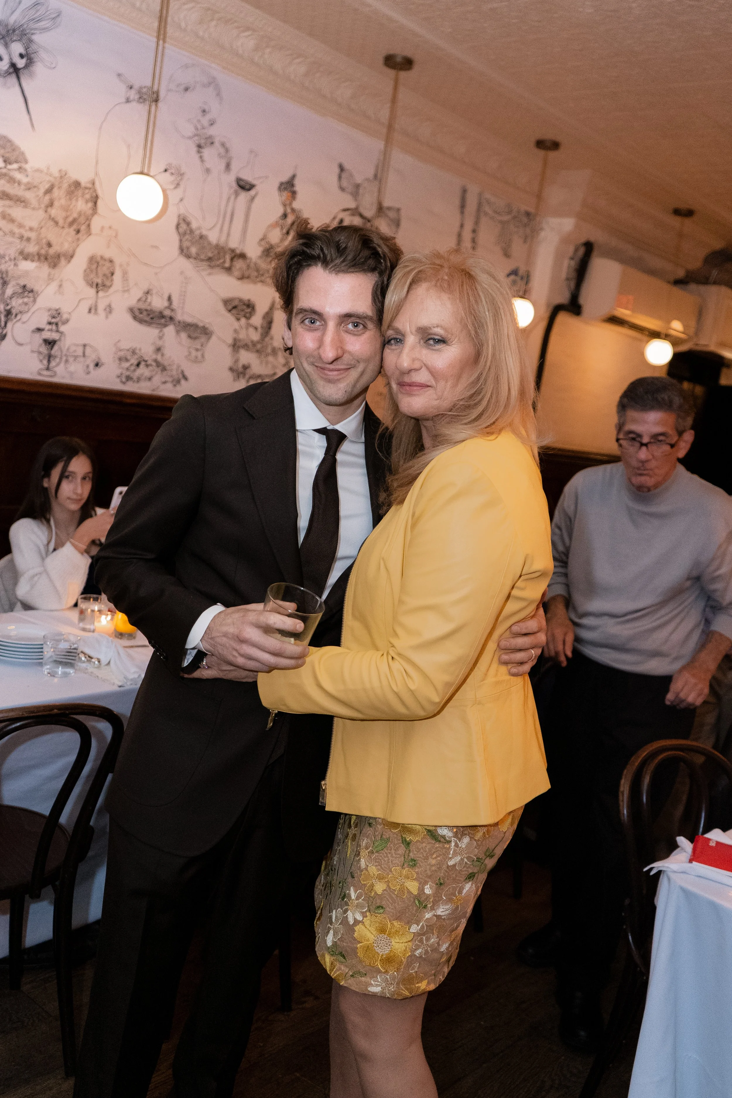  Stef Reyes Photo. New York City micro-wedding dinner party with candlelit tables, cozy ambiance, and heartfelt toasts at F&amp;F Restaurant in Carroll Gardens. Candid wedding photography capturing a small, meaningful dinner celebration in Brooklyn, 