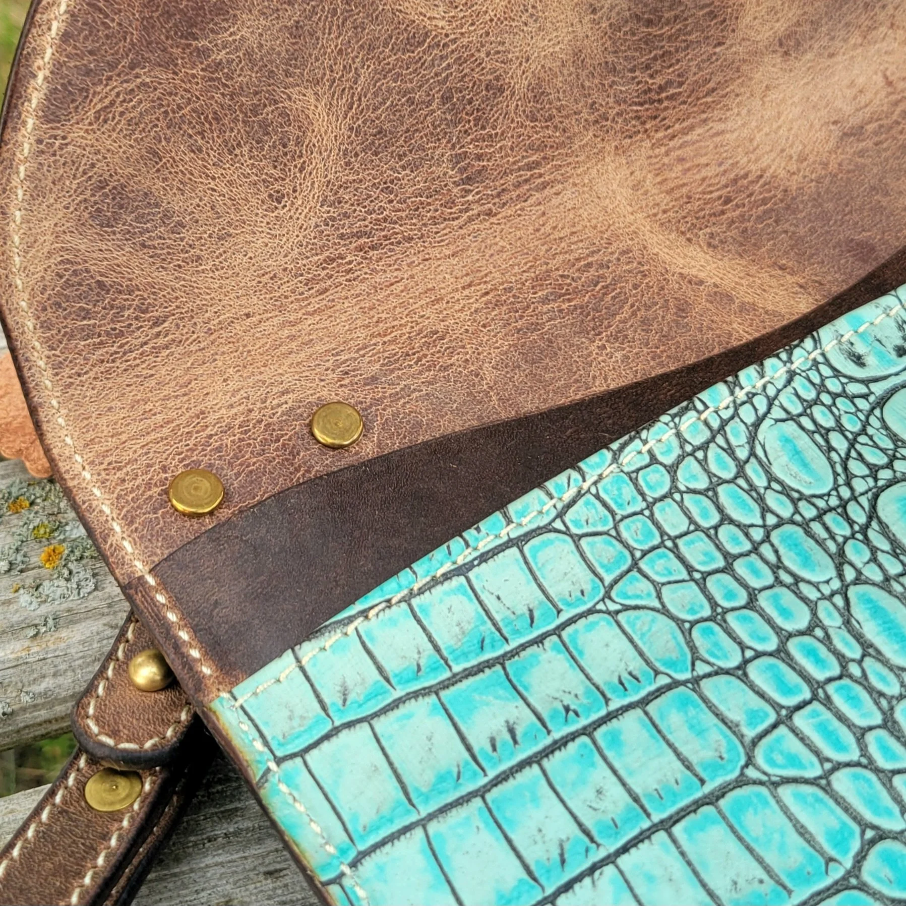 Handmade leather clutch wallet showing pocket detail