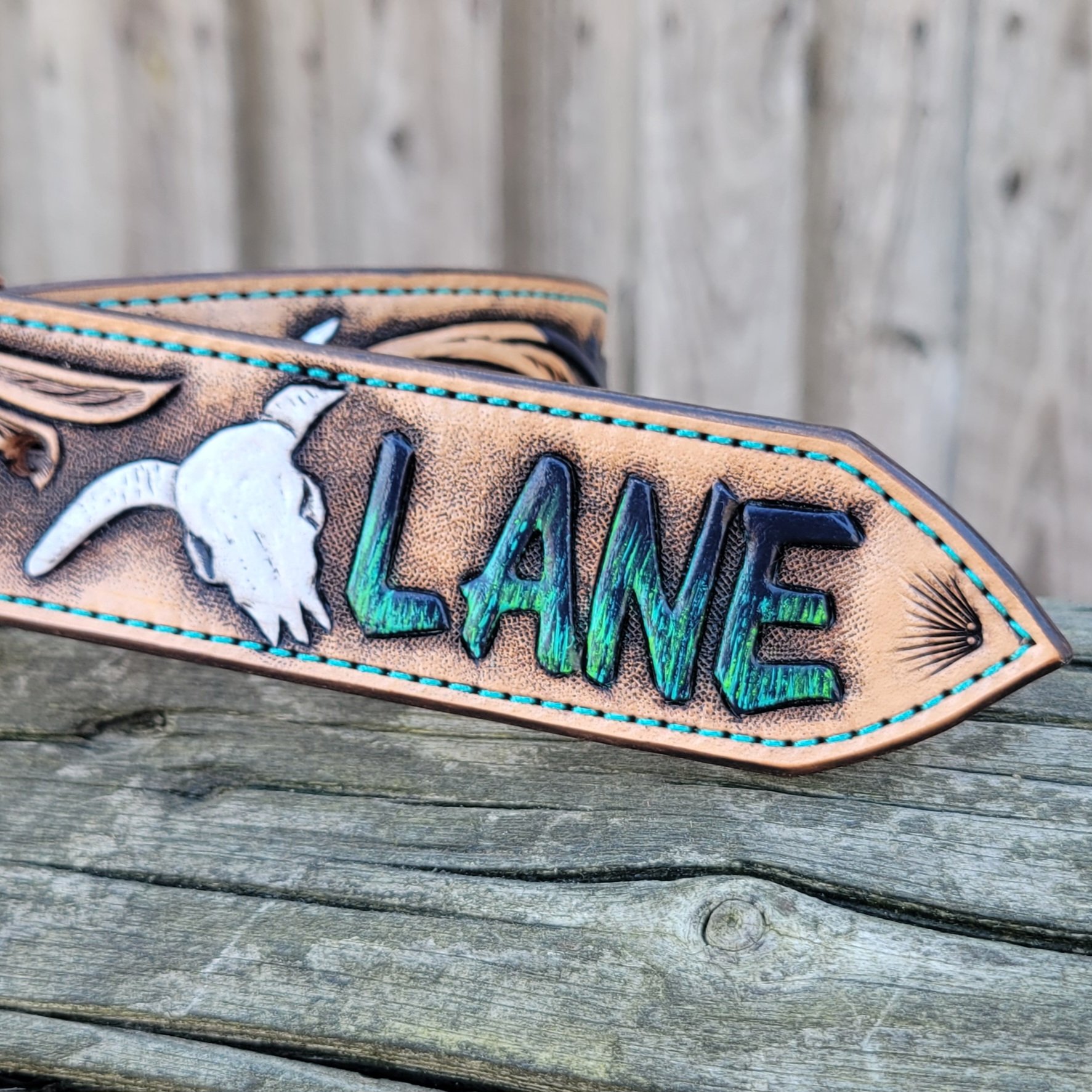 Custom tooled belt with bull skull and painted name