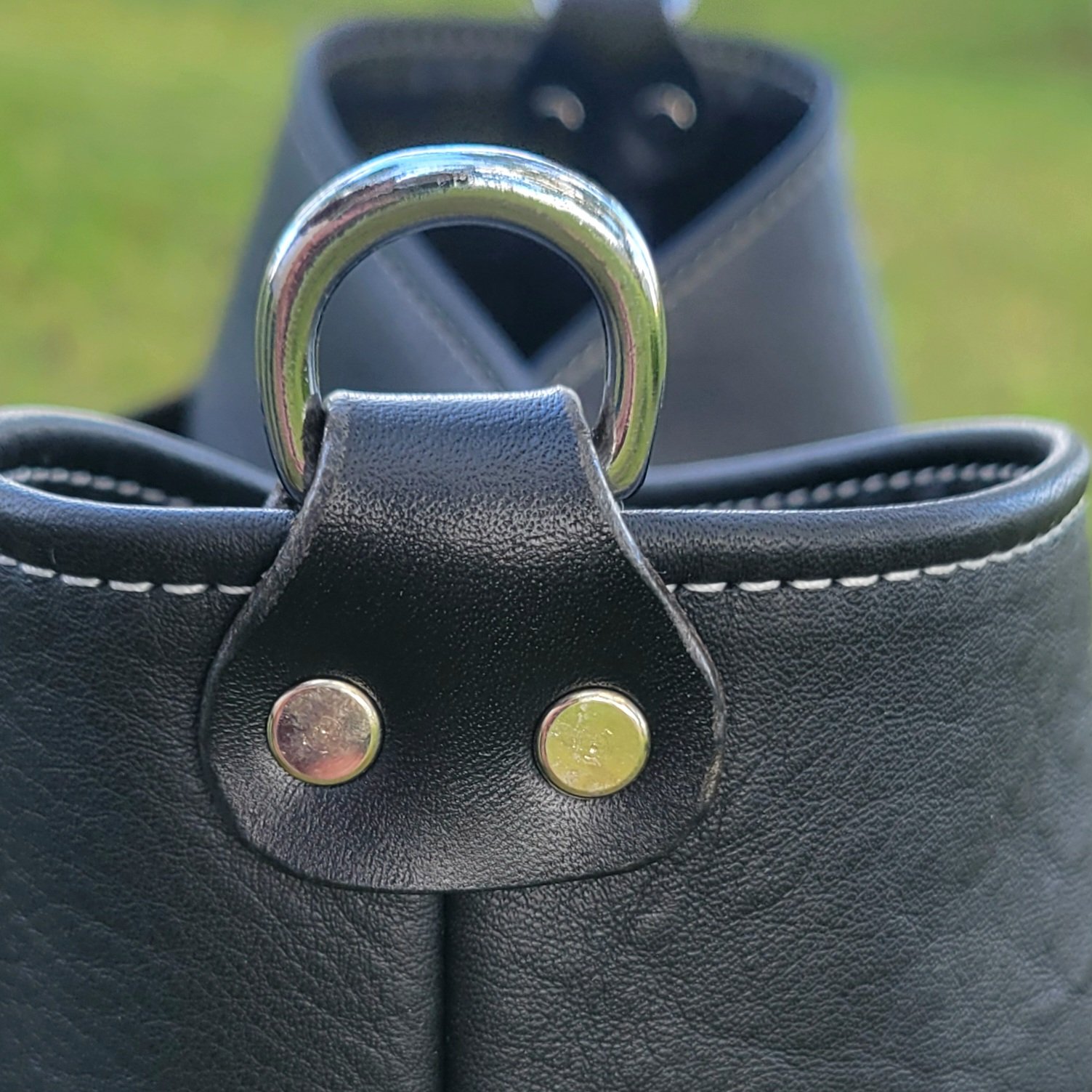 Crossbody strap attachment D ring in black bridle leather