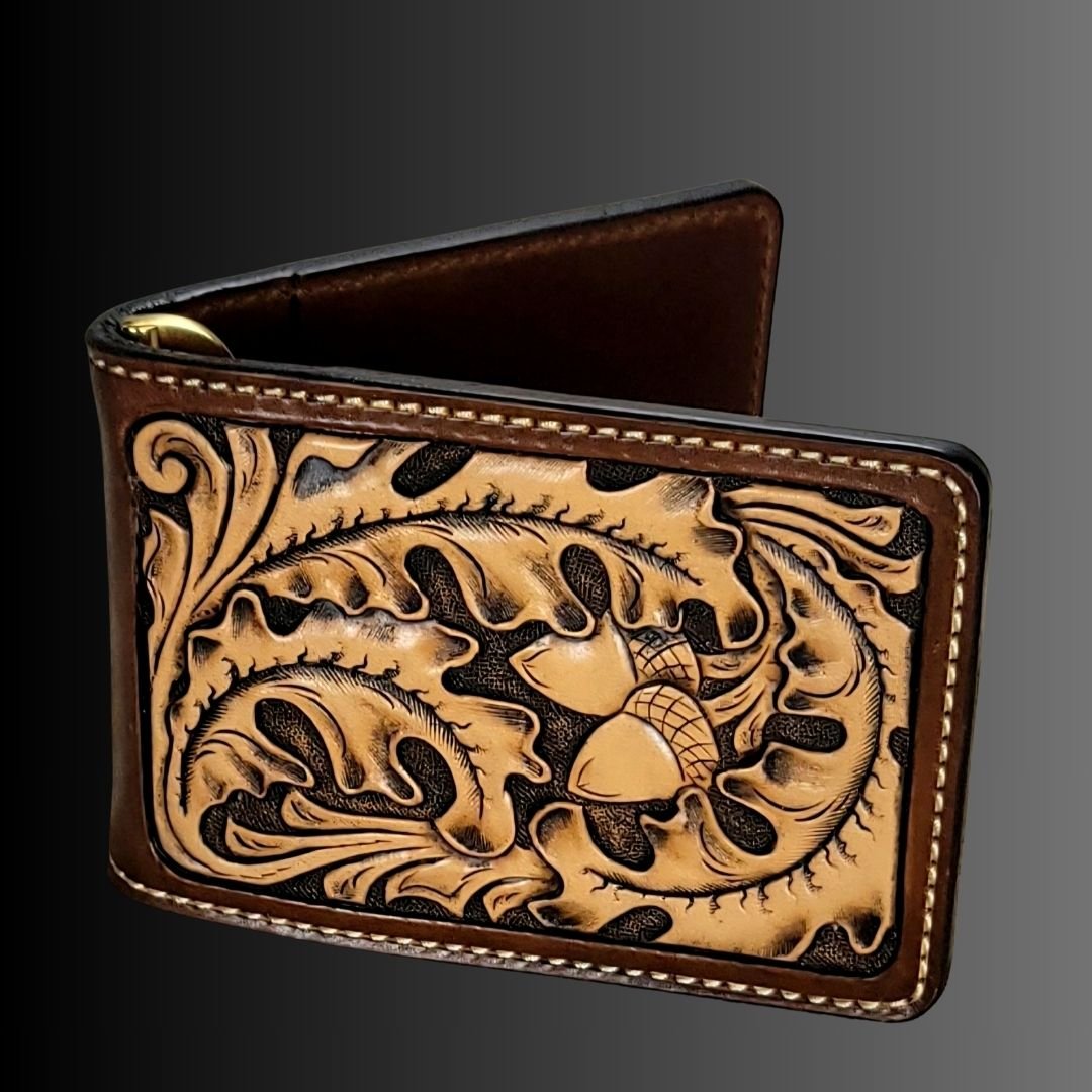Western leather money clip wallet tooled in an oak design in two tone mahogany
