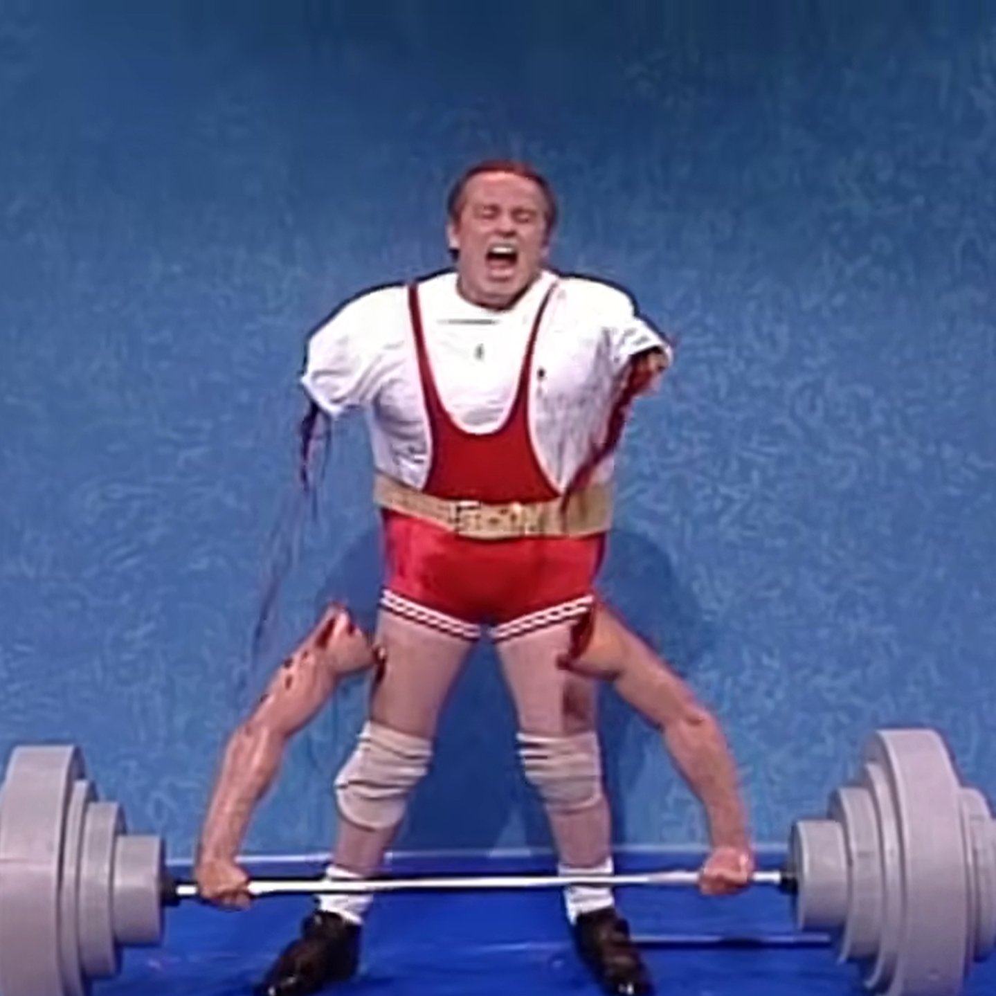 Image from SNL of Phil Hartman dressed as a body builder, but  he's bleeding from his shoulders as his arms are still attached to the barbell he was trying to lift.