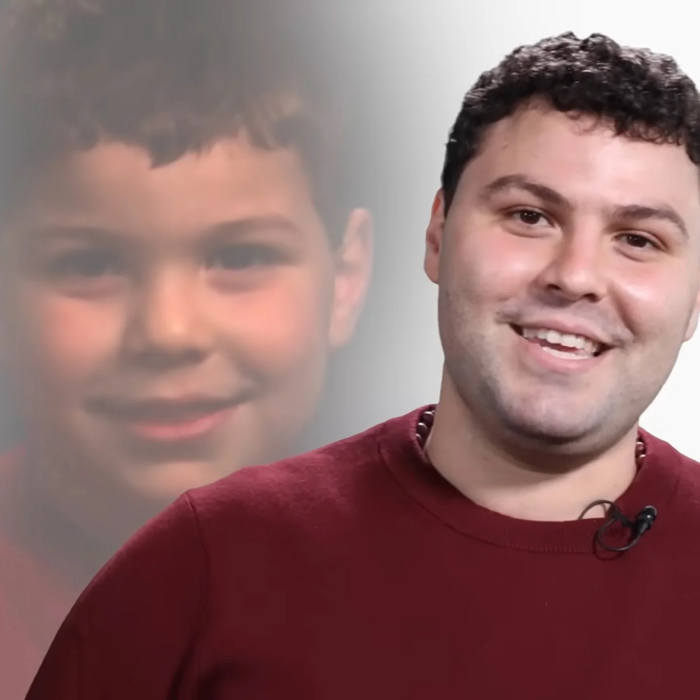 Still shot of the "Did you ever have a dream" kid, now as an adult, talking to the camera. You can see an image of him as a kid in the background.