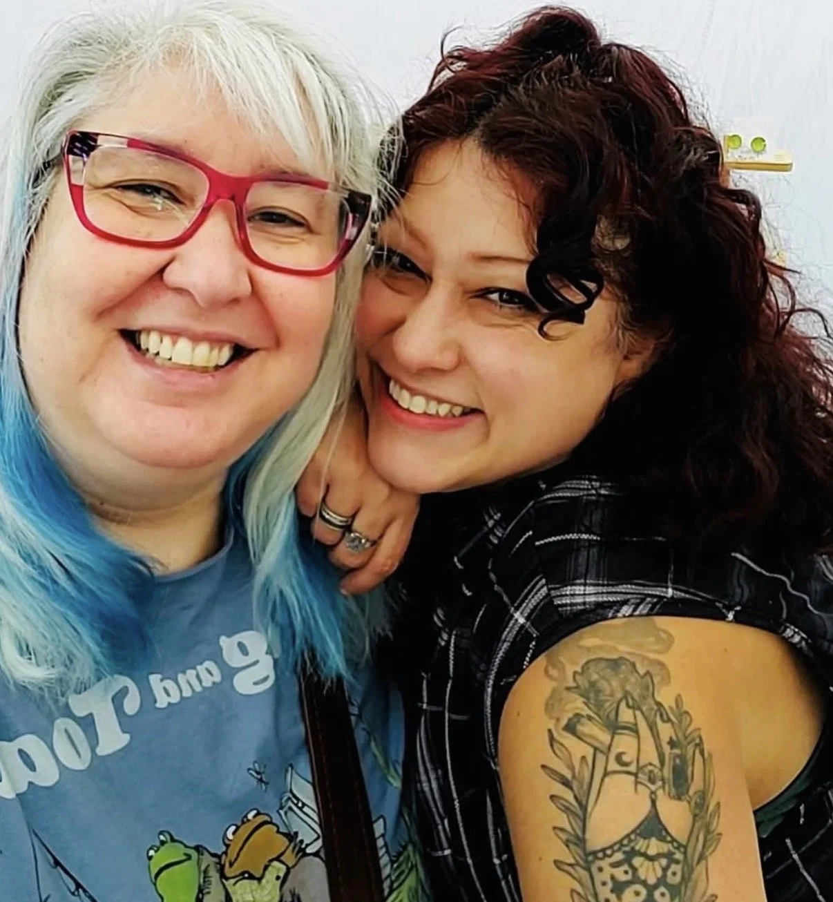 Sarah Meranda (on the right) leaning on the shoulder of a friend and fellow ten, Elissa!))