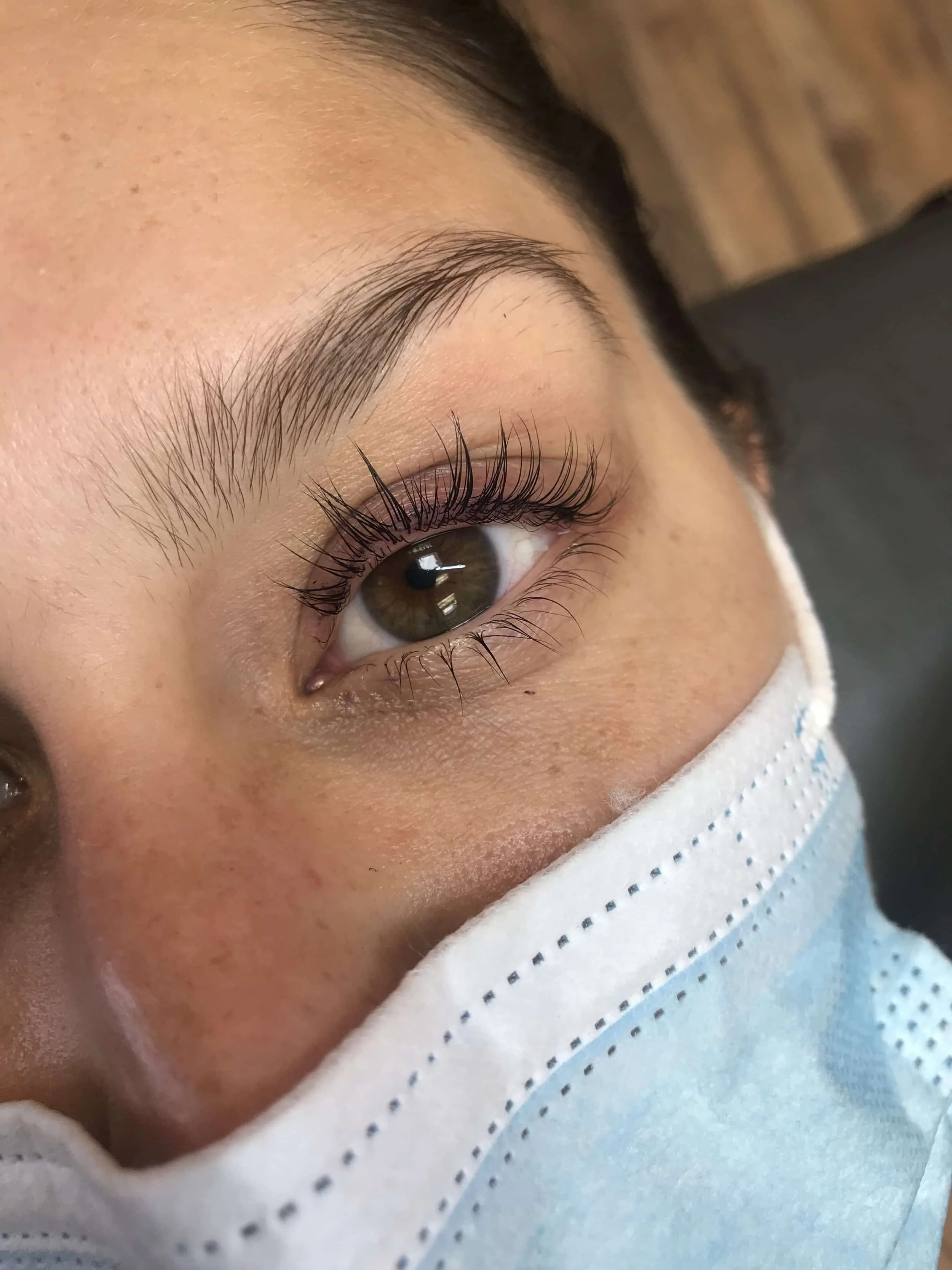 Female client with long eyelashes after lash lift