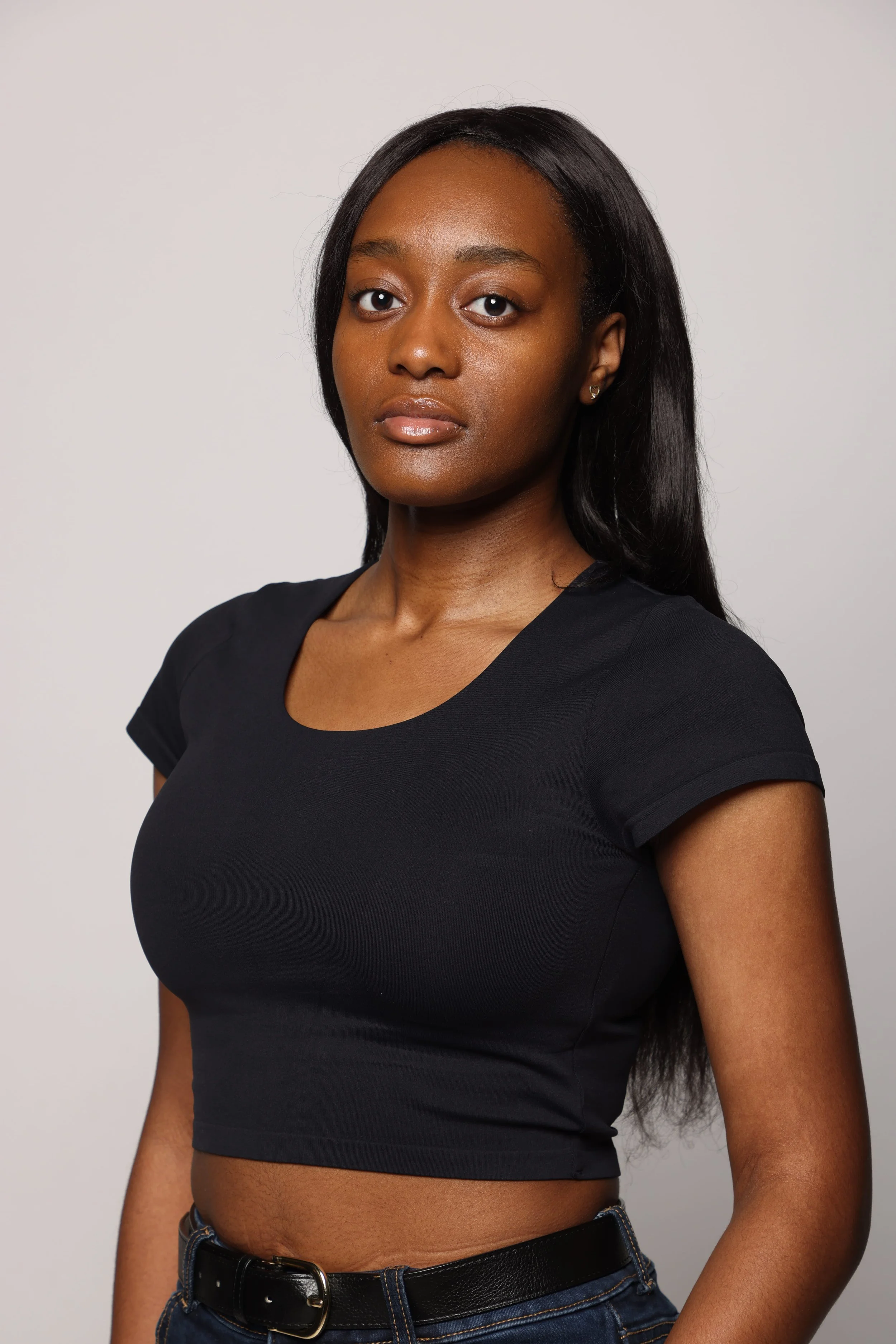 woman black tshirt black pants smiling3.jpg