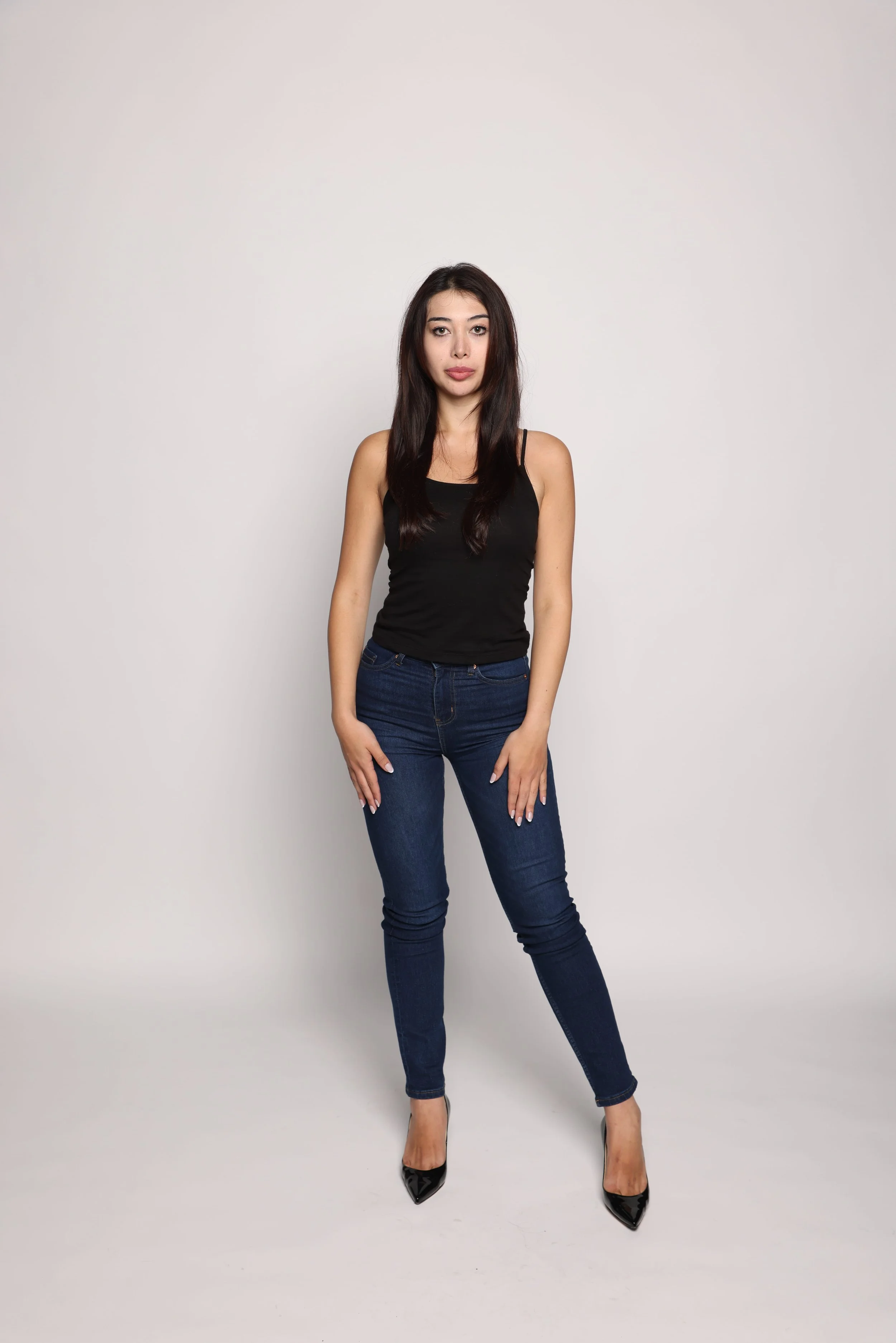 woman black tshirt black jean smiling1.jpg