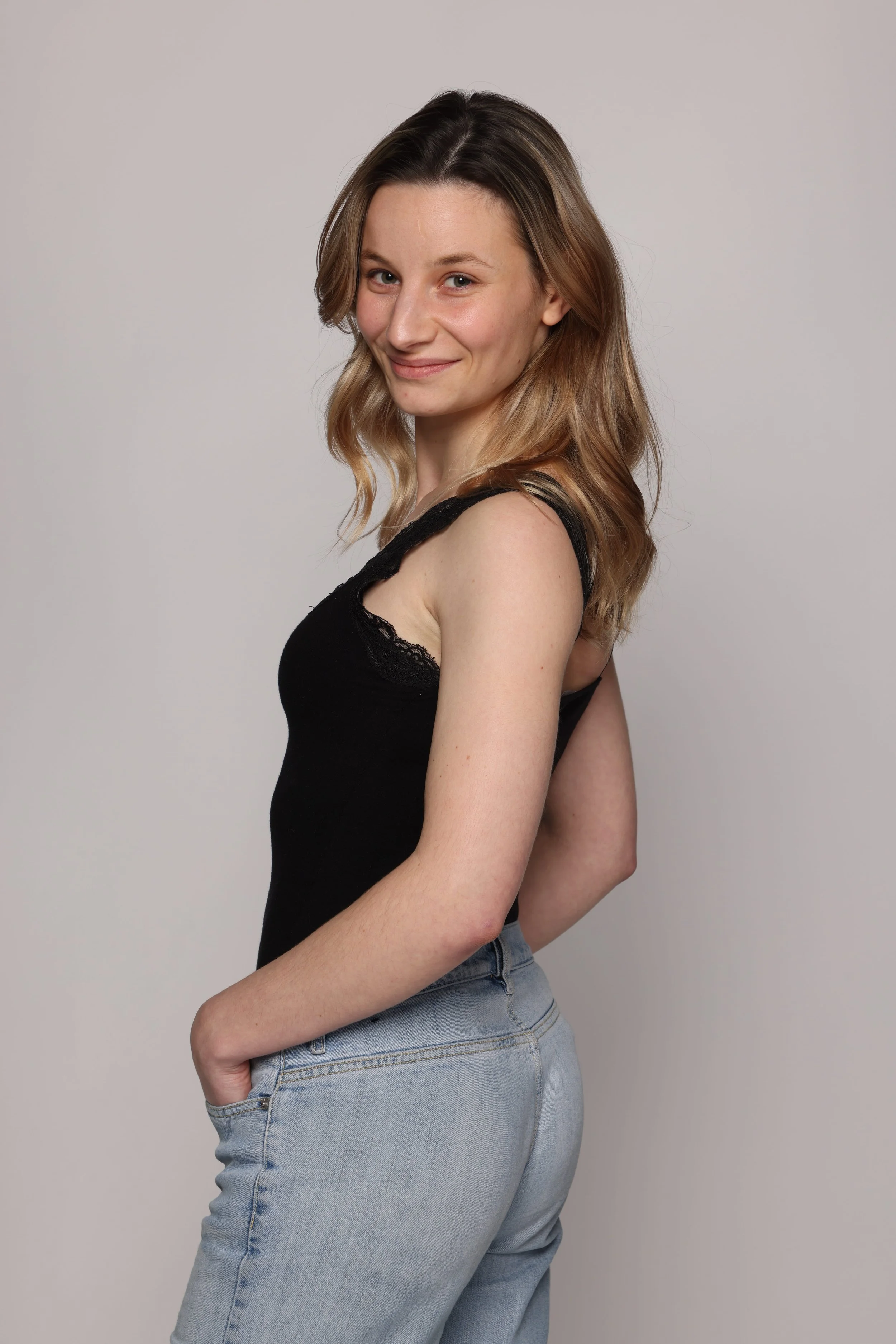 women in blonde hair black top (2).jpg