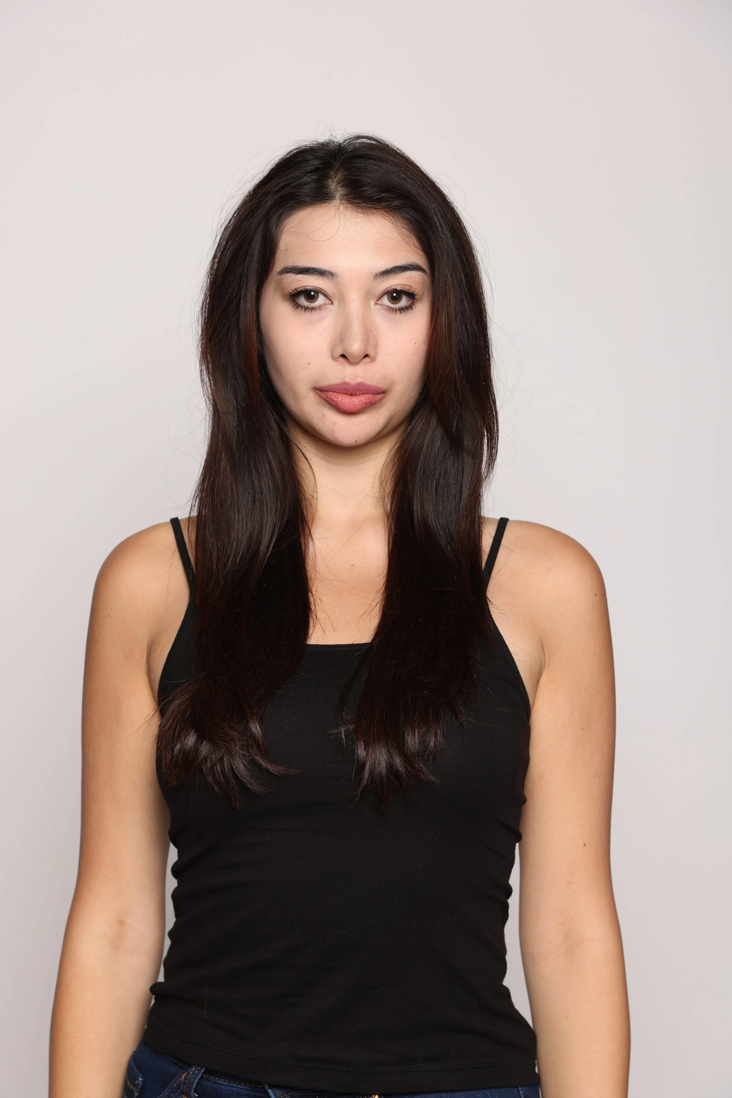 woman black tshirt black jean smiling3.jpg