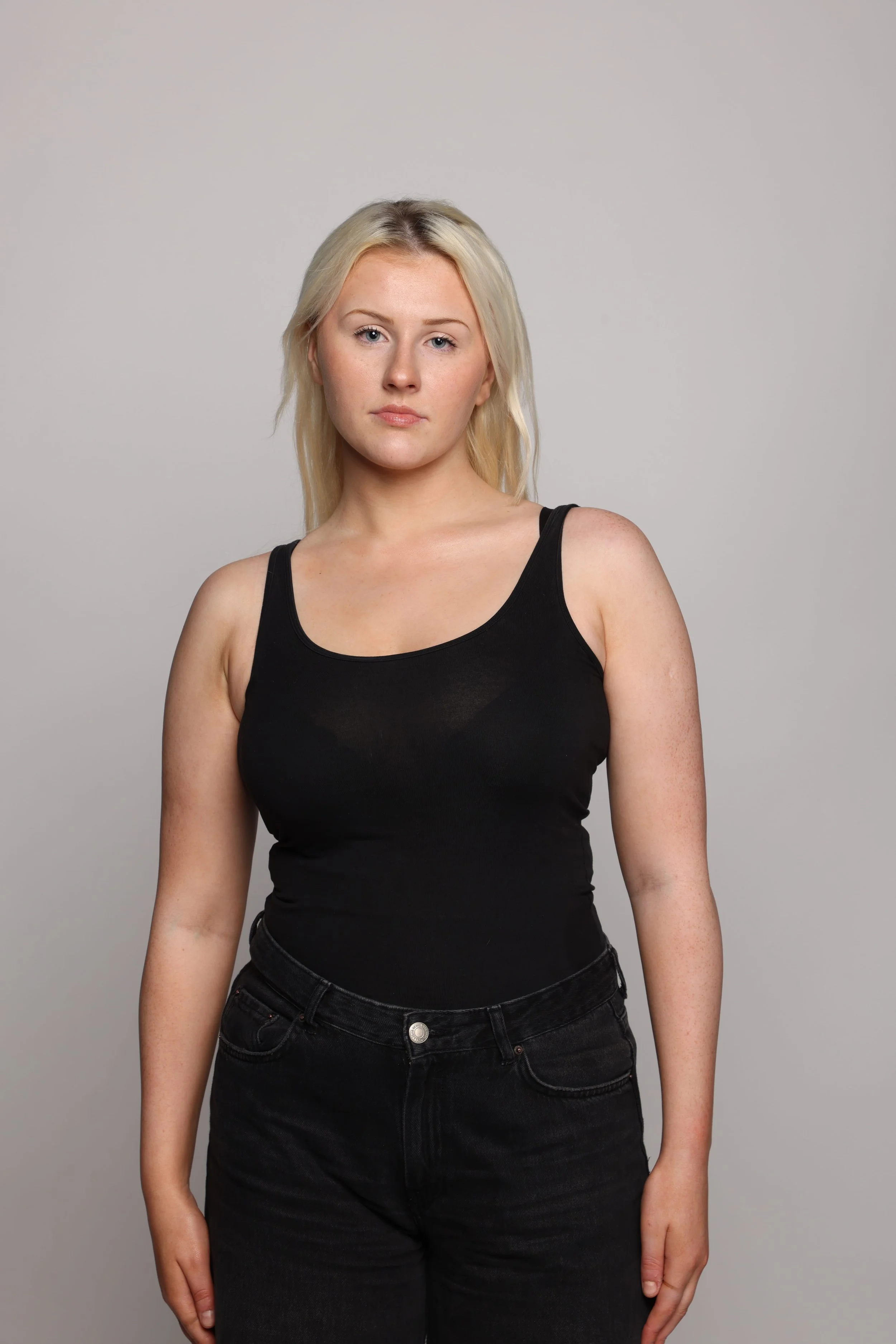 model in blonde hair black top (1).jpg